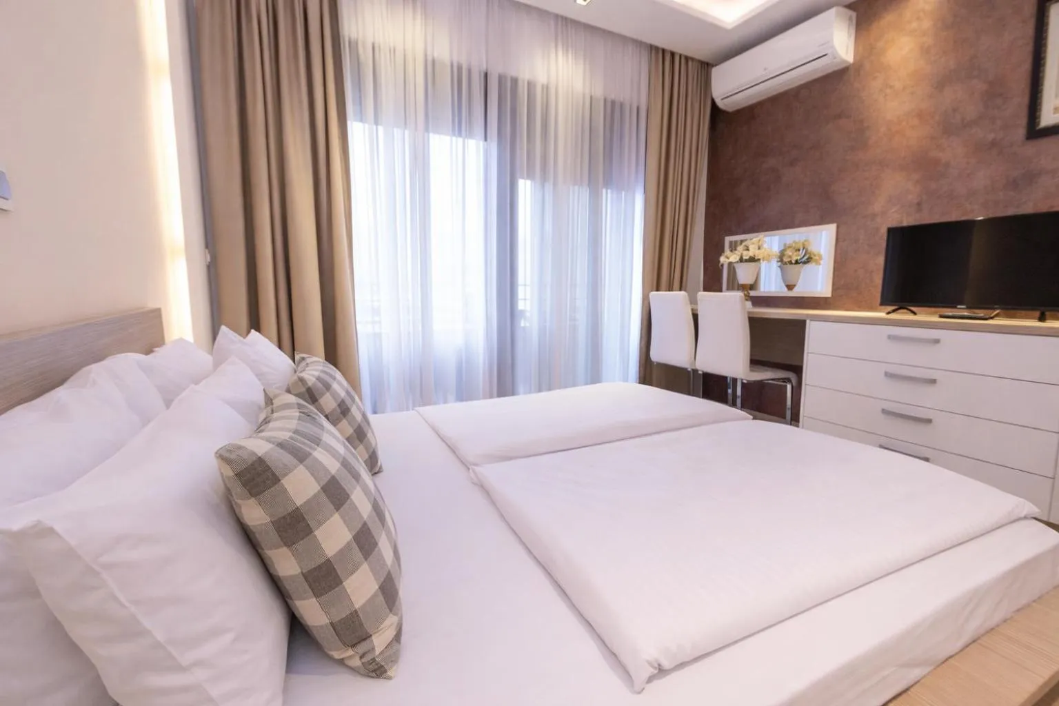 Bed in Hotel Butua Residence