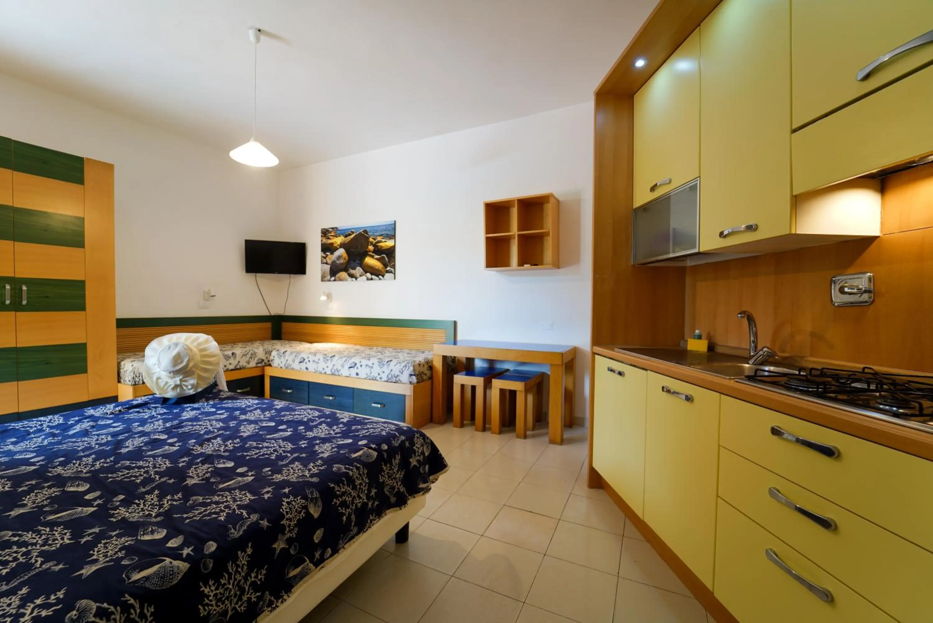 Kitchen or kitchenette, Bed in Residence Le Acacie