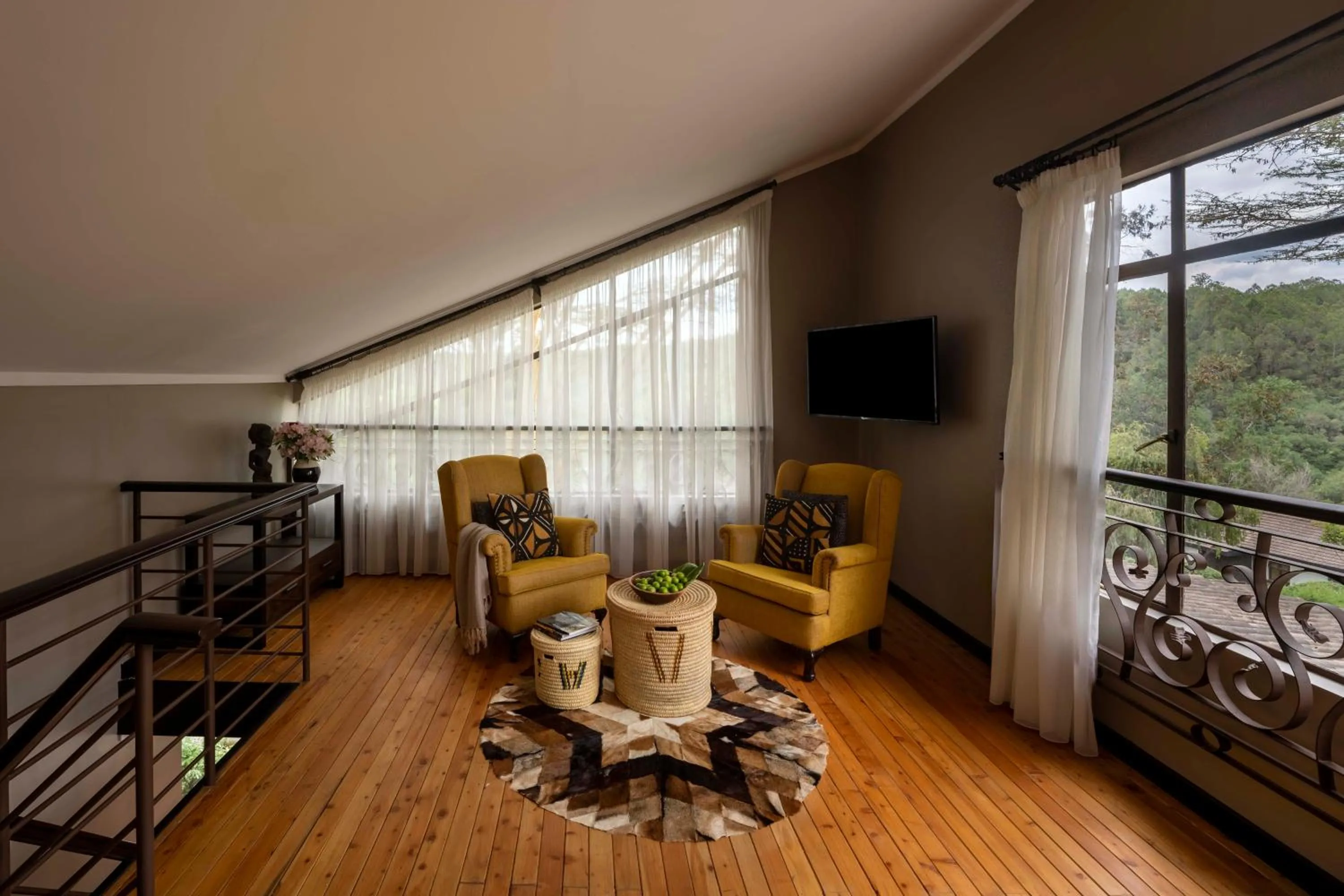 Communal lounge/ TV room in Fairmont Mount Kenya Safari Club