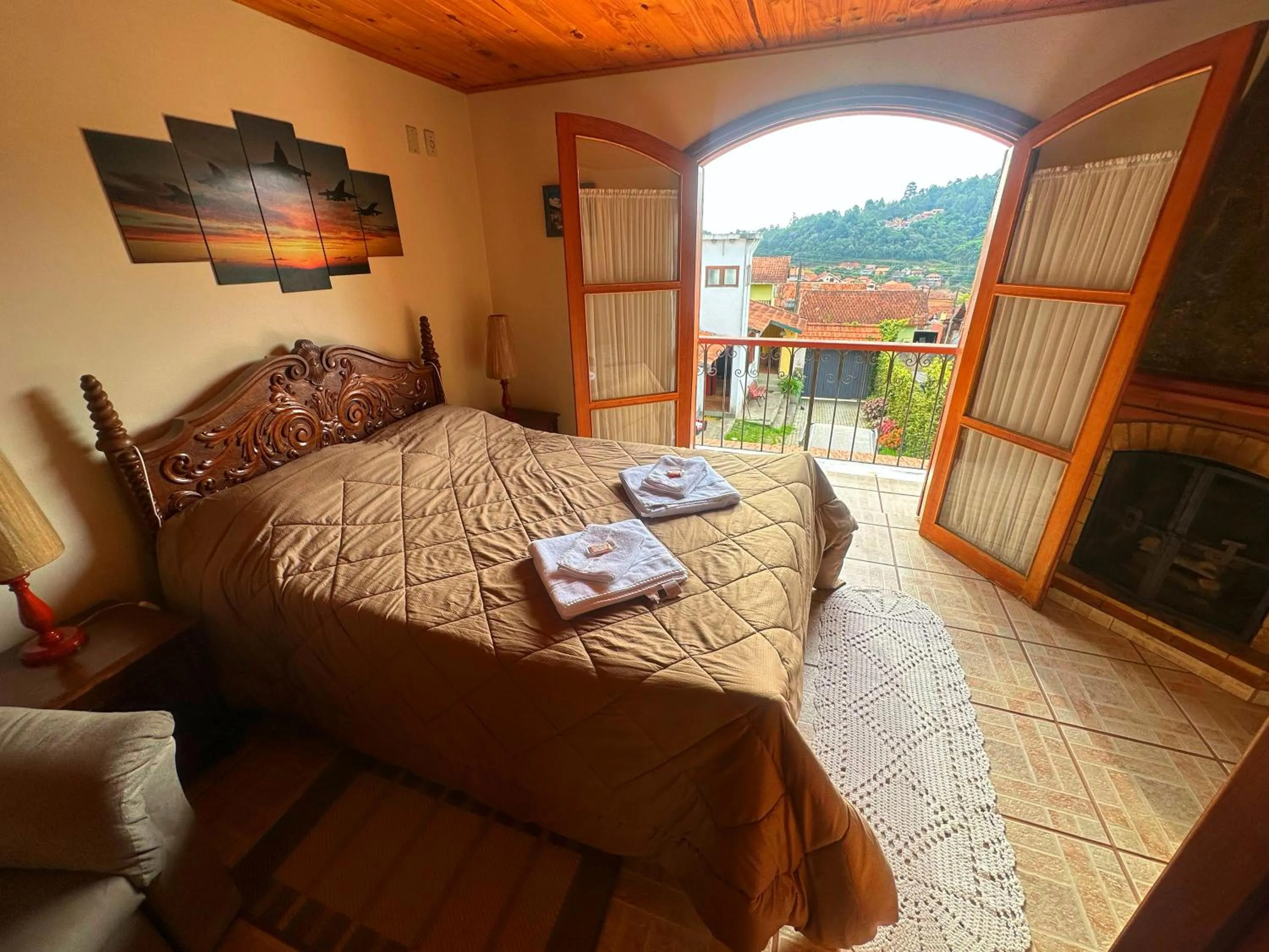 Bed in Chalé Dumont Pousadinha