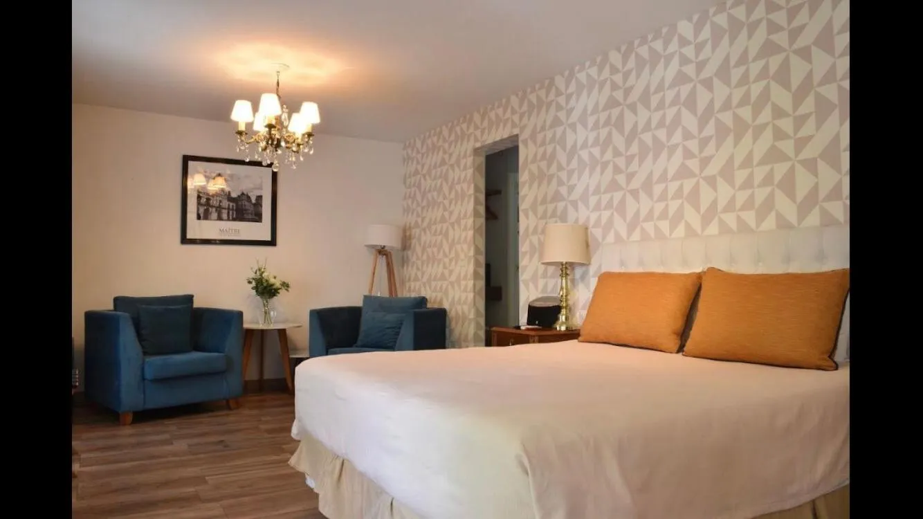 Bed in Maitre Hotel Boutique