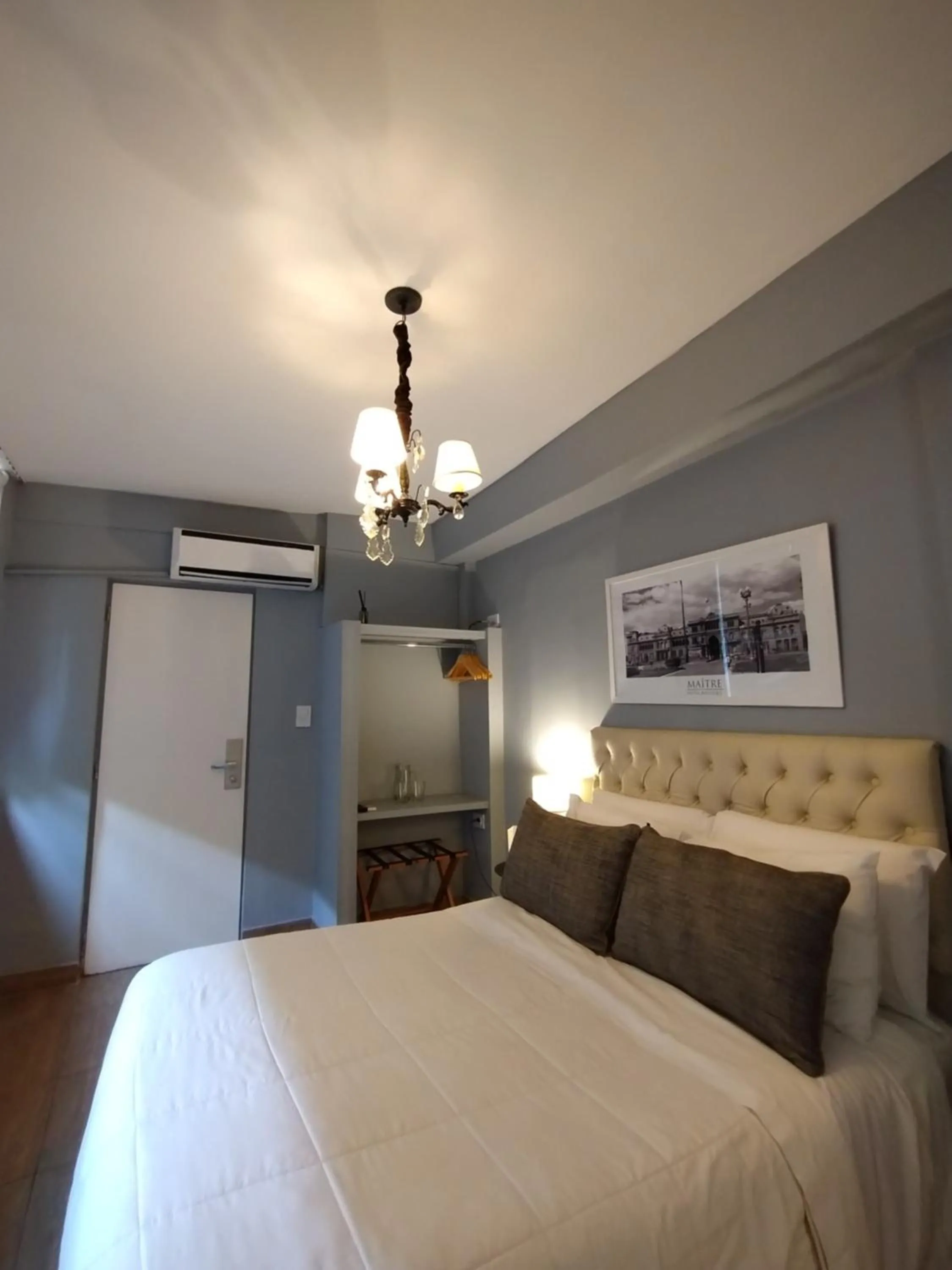 Bed in Maitre Hotel Boutique