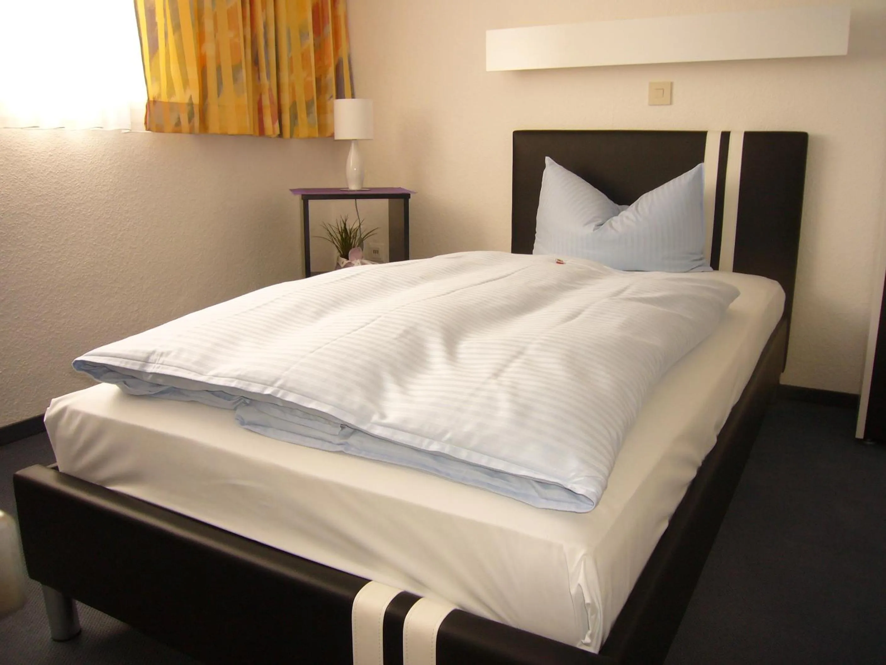 Bed in Hotel Stadt Munster