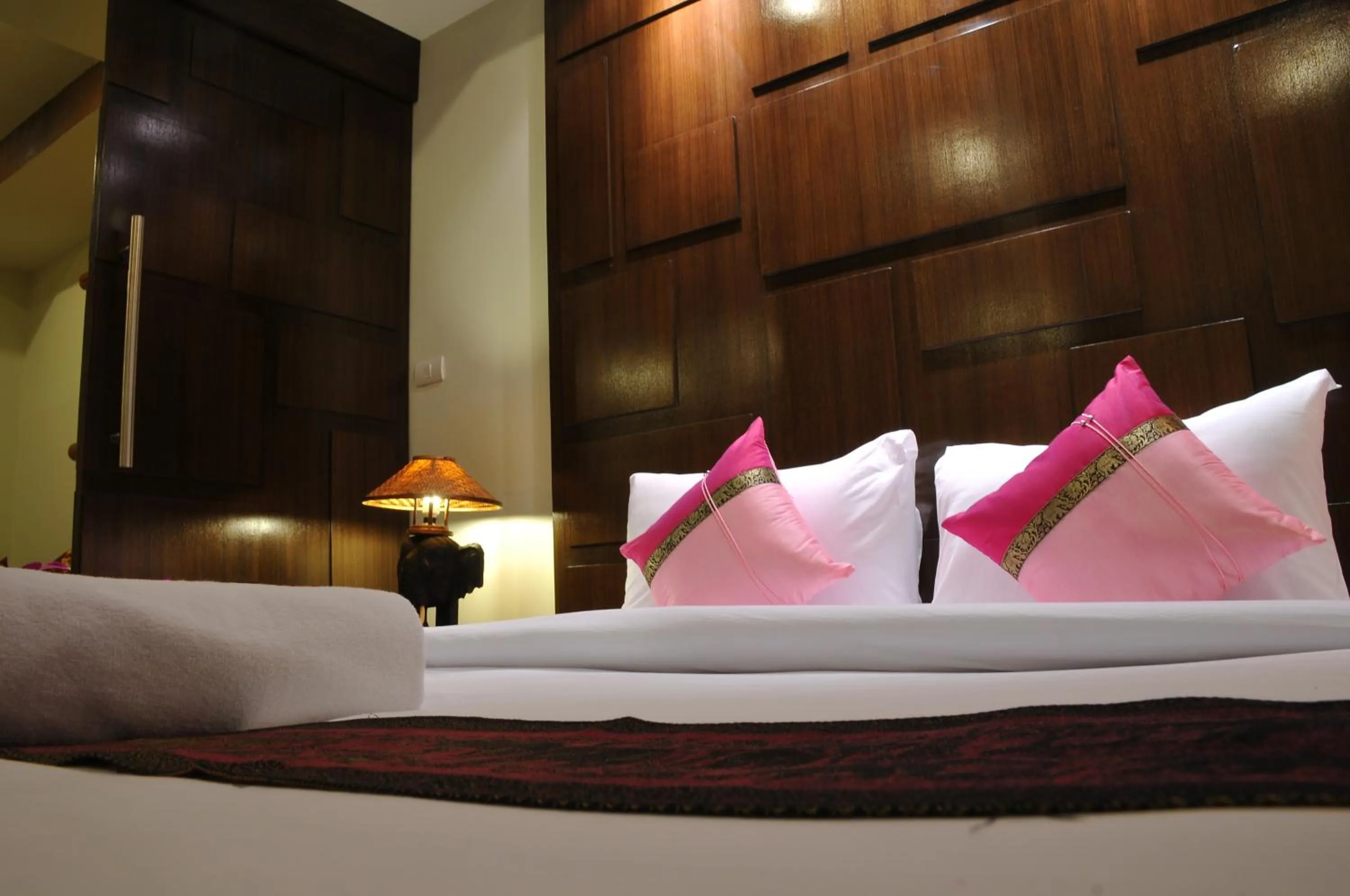 Bed in Boonjumnong Modern Apartment