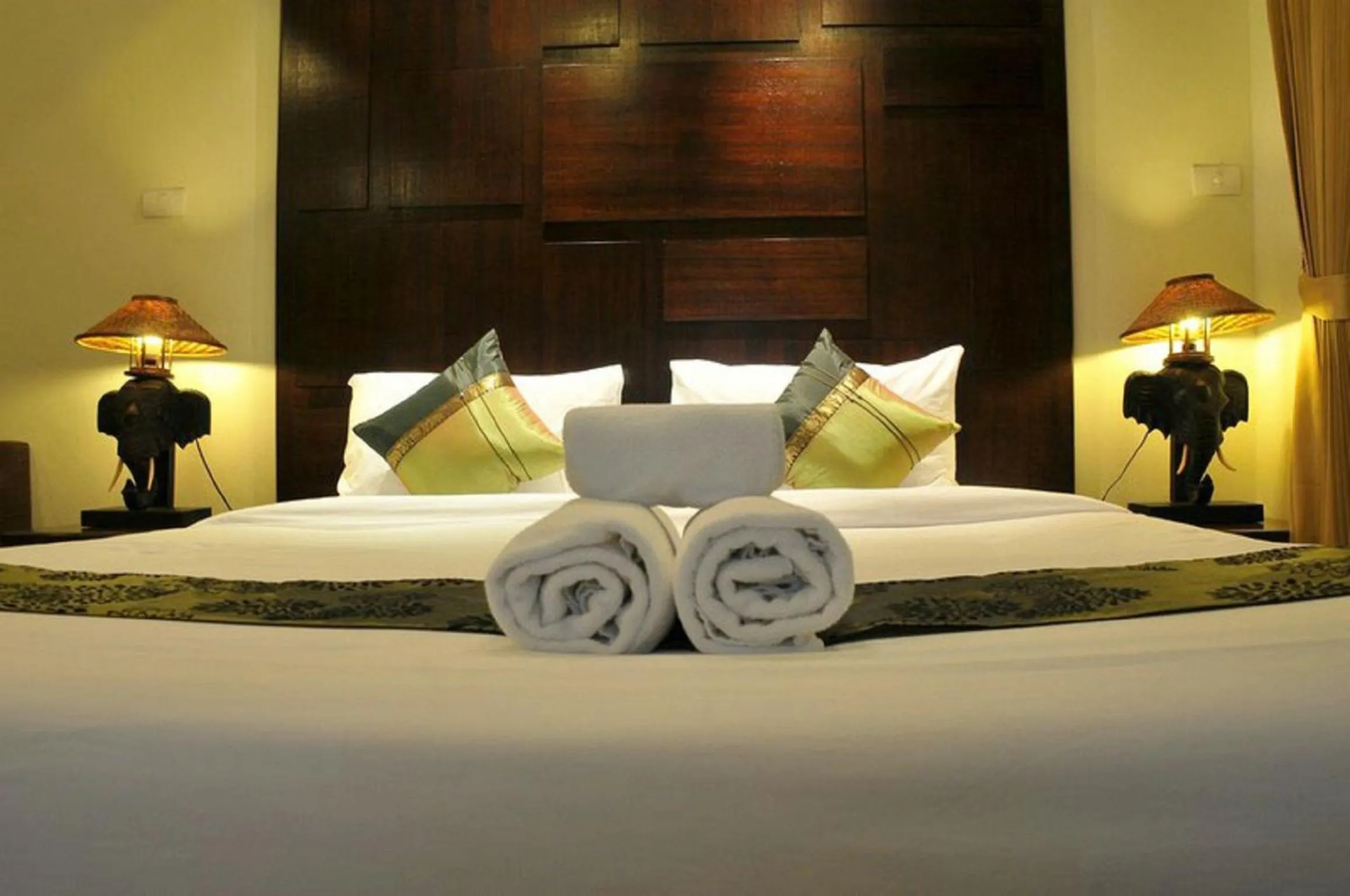 Bed in Boonjumnong Modern Apartment