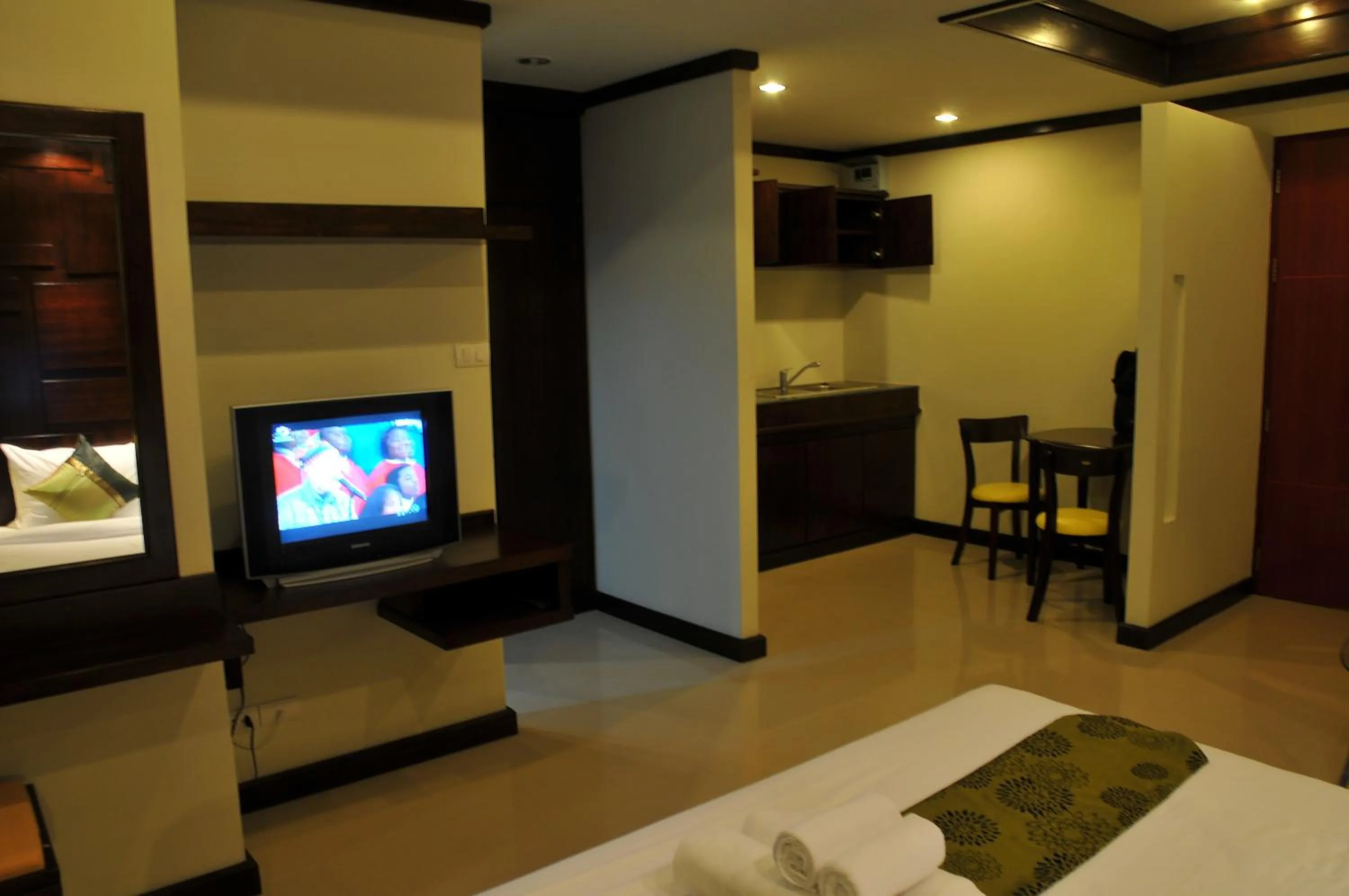 Bed in Boonjumnong Modern Apartment