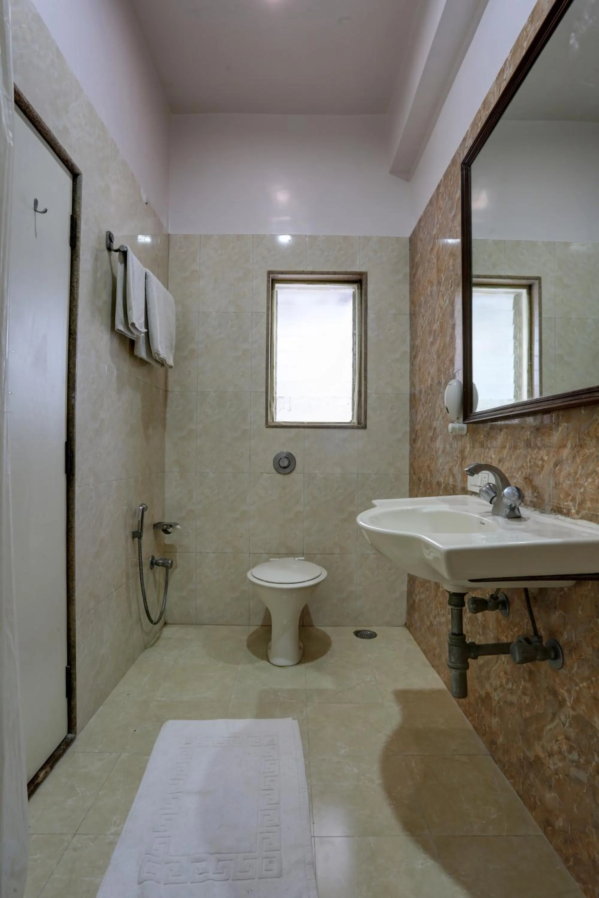 Toilet in Accord Hotel