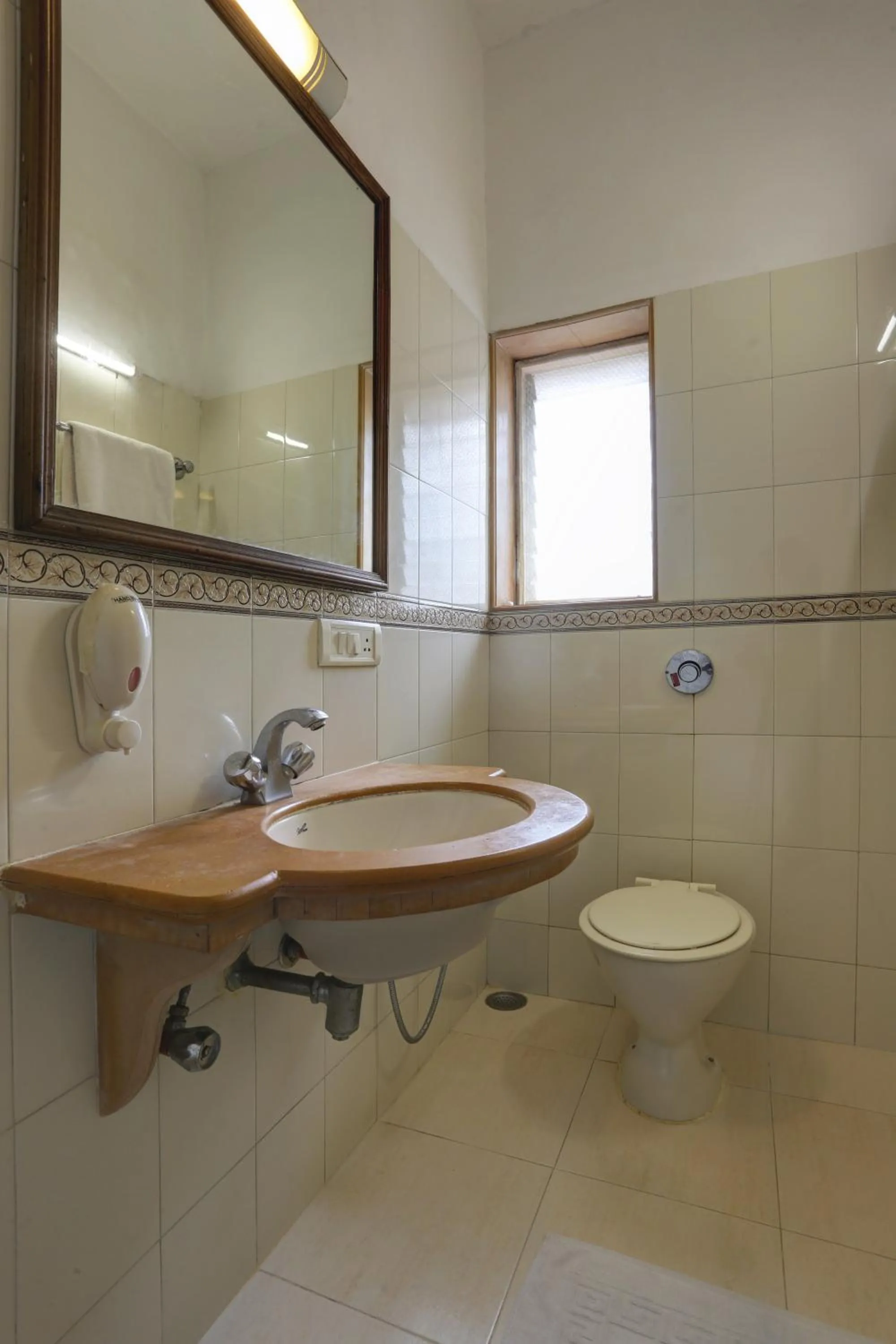 Toilet in Accord Hotel