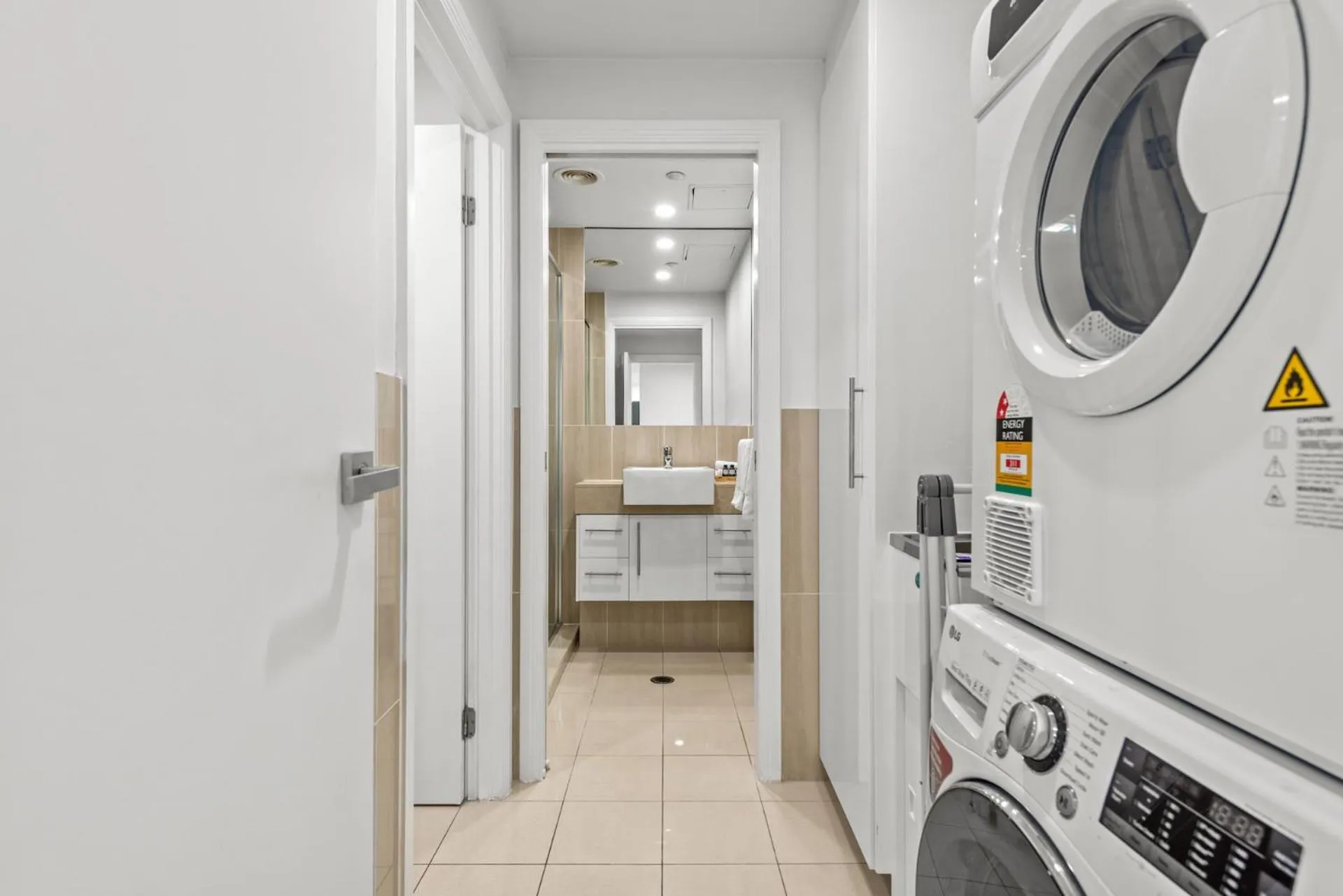 washing machine in Proximity Waterfront Apartments