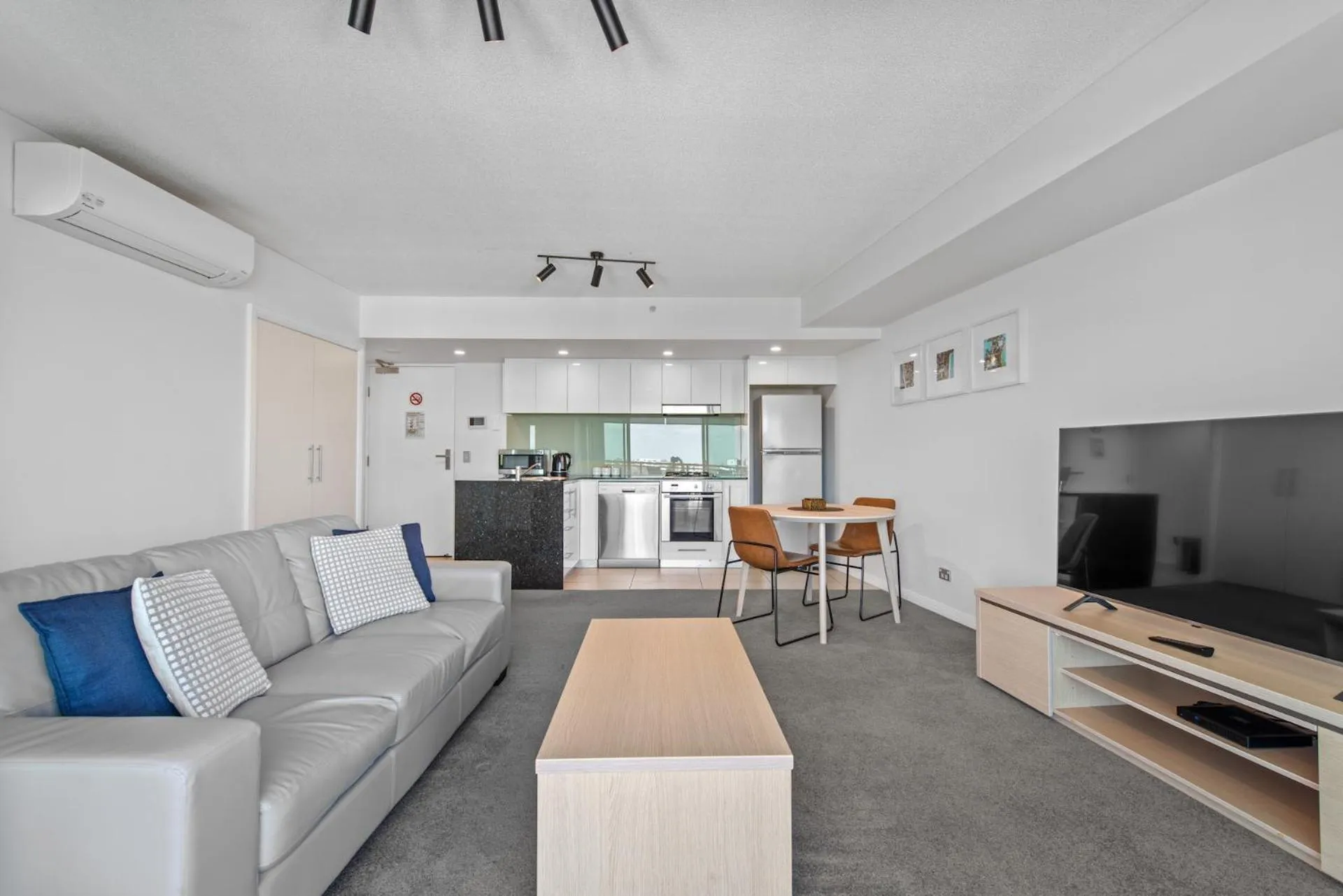 Living room in Proximity Waterfront Apartments