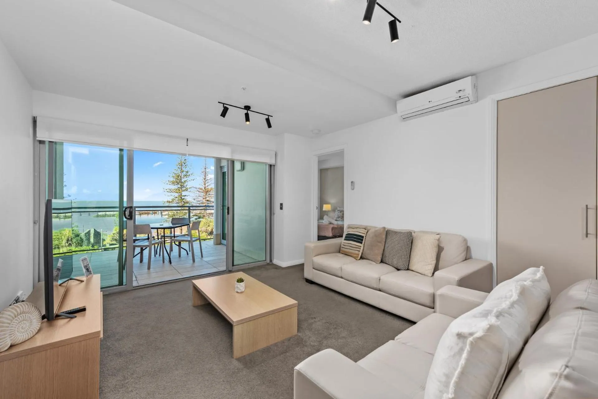 Living room in Proximity Waterfront Apartments
