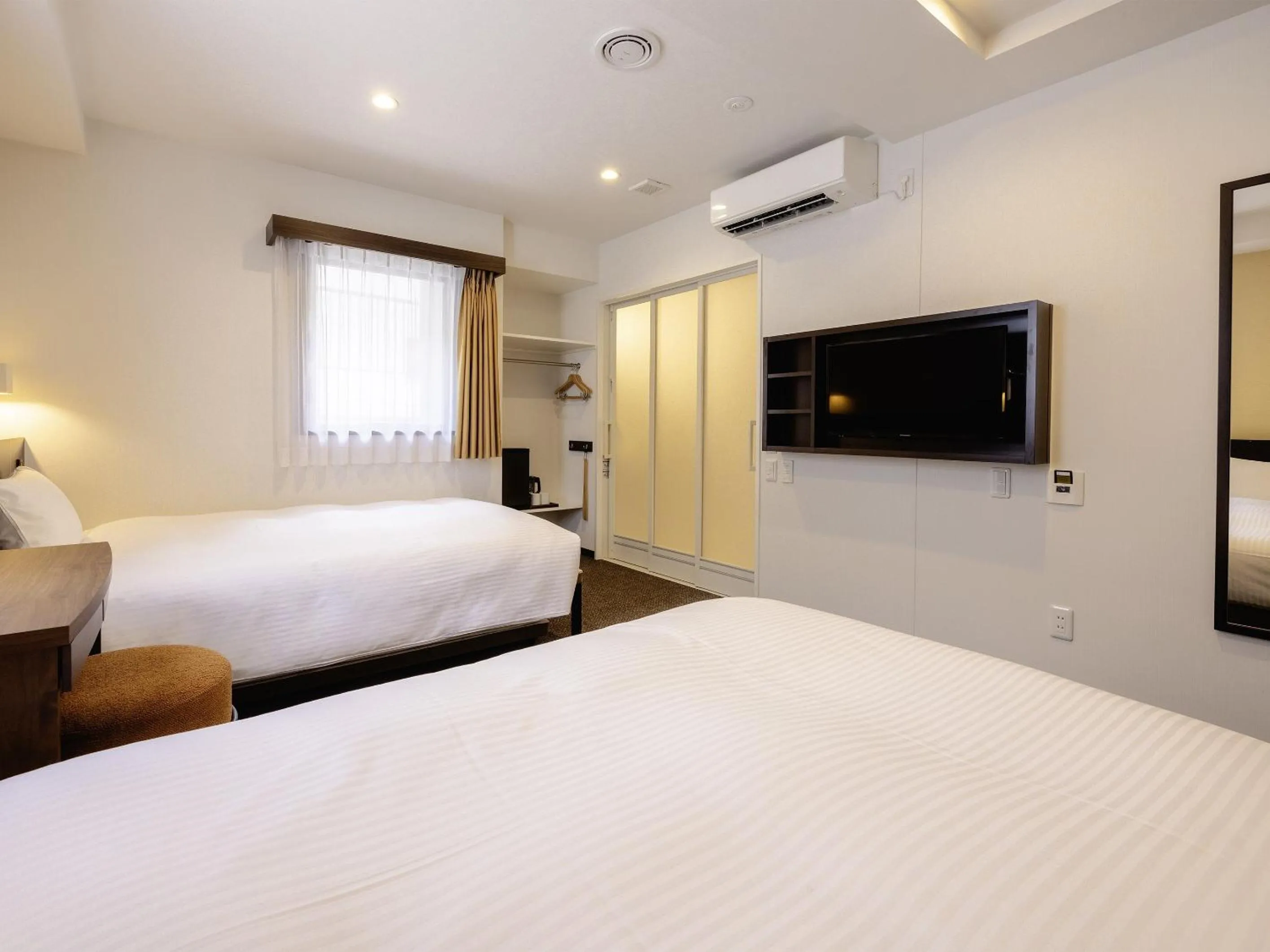 Bed in Hotel Wing International Tokyo Akabane