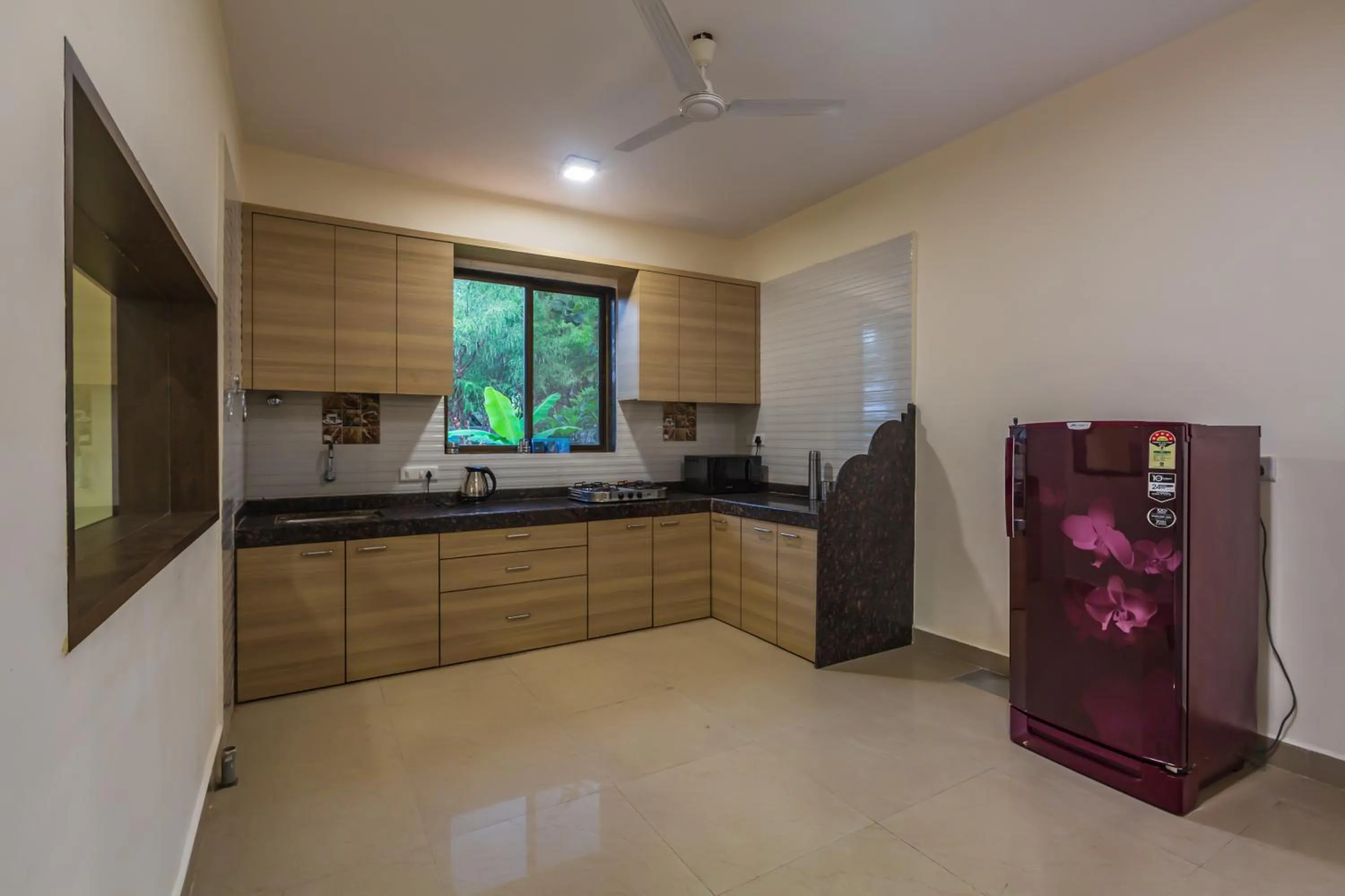 Day in SaffronStays Ekaant- 3BR pet-friendly pool villa with lawn, games & river walk in gated community near Mumbai