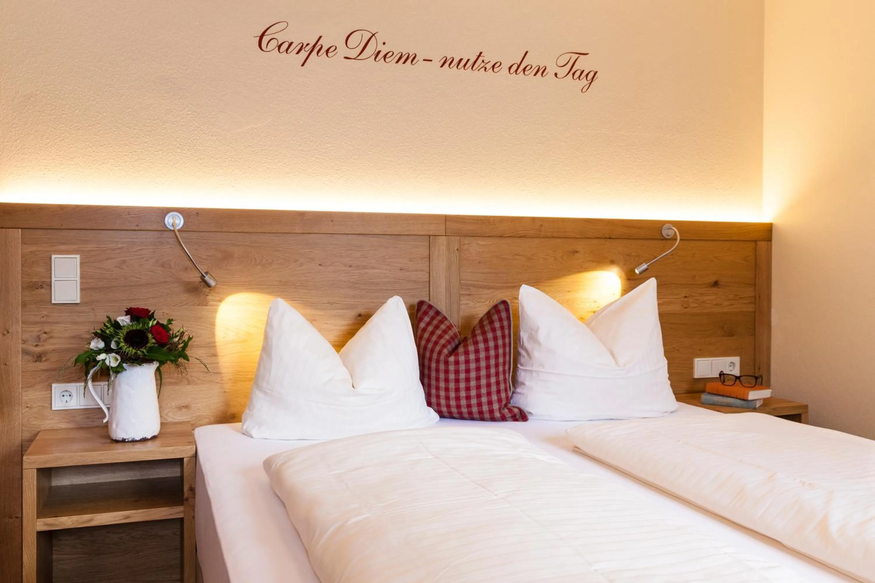 Bed in Hotel Kaiser in Tirol