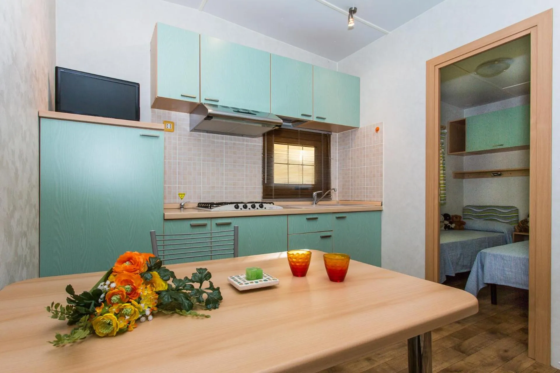 Kitchen or kitchenette in Club del Sole Rivaverde Easy Camping Village