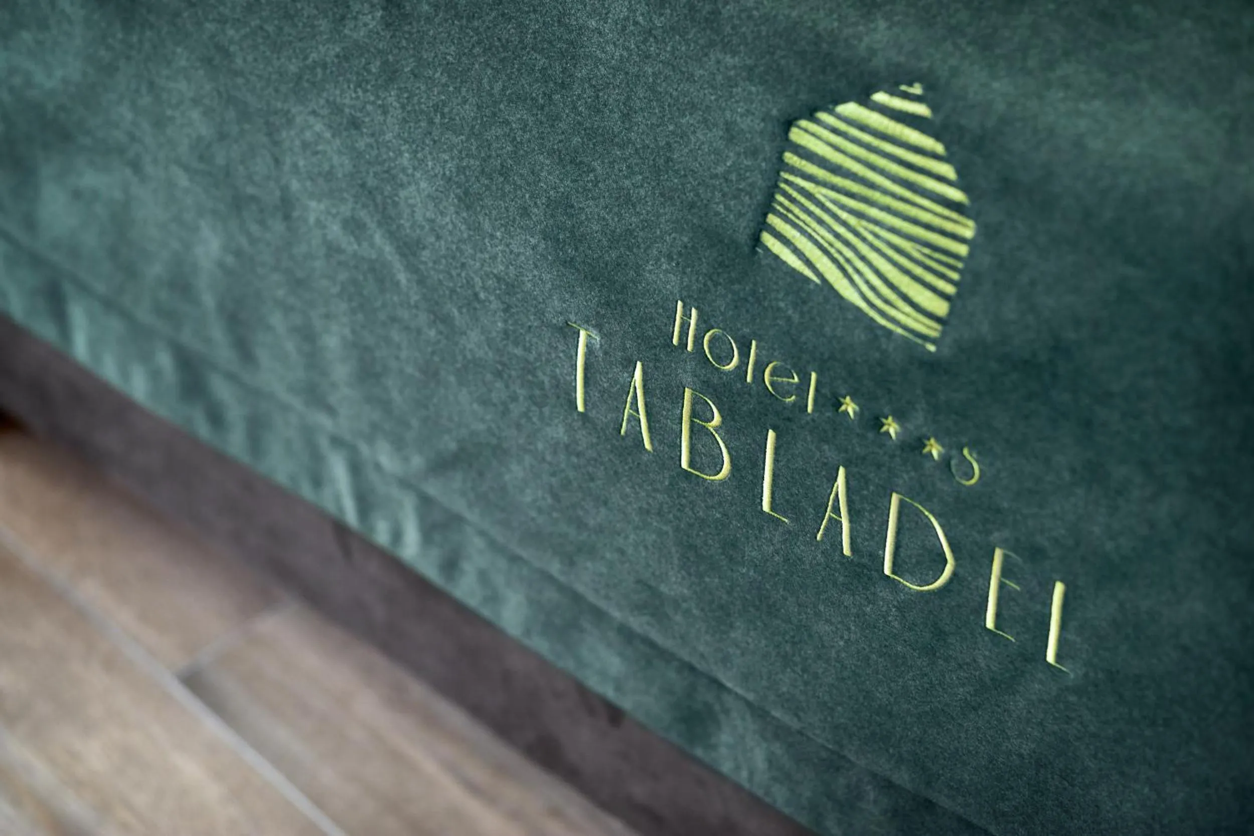 Property logo or sign in Hotel Tabladel