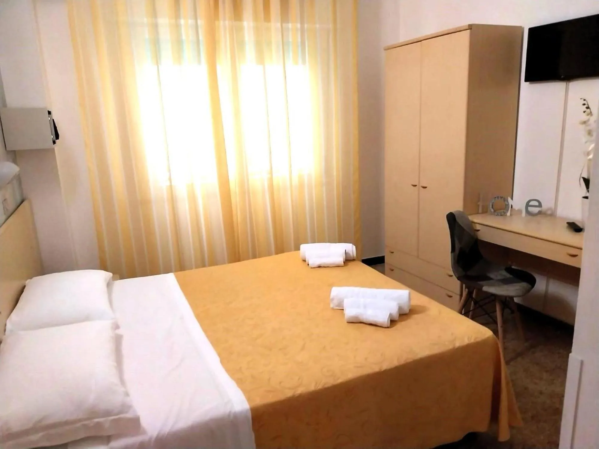 Bed in Hotel Angela