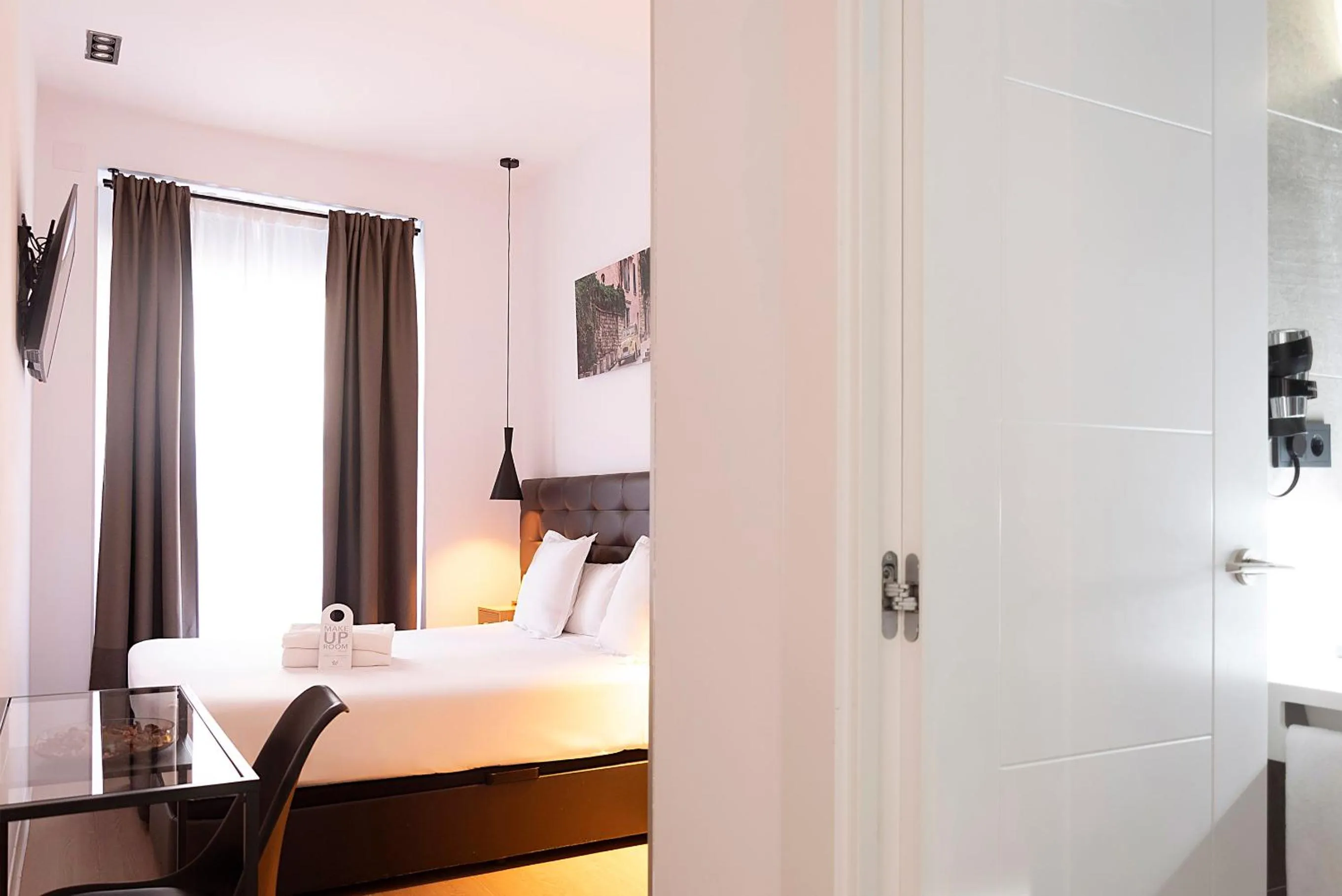 Bed in Woohoo Rooms Chueca