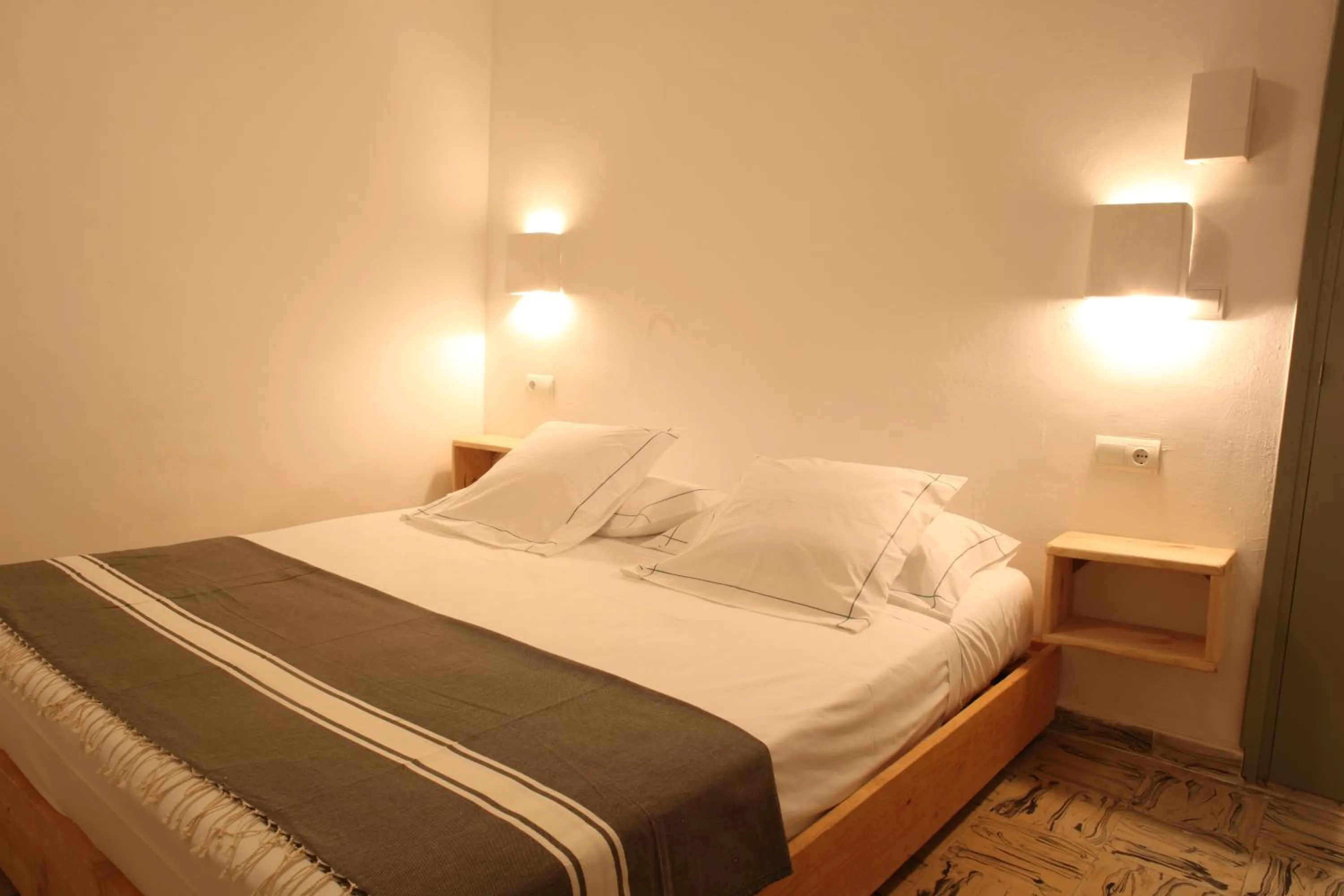 Bed in Juanita Hostal