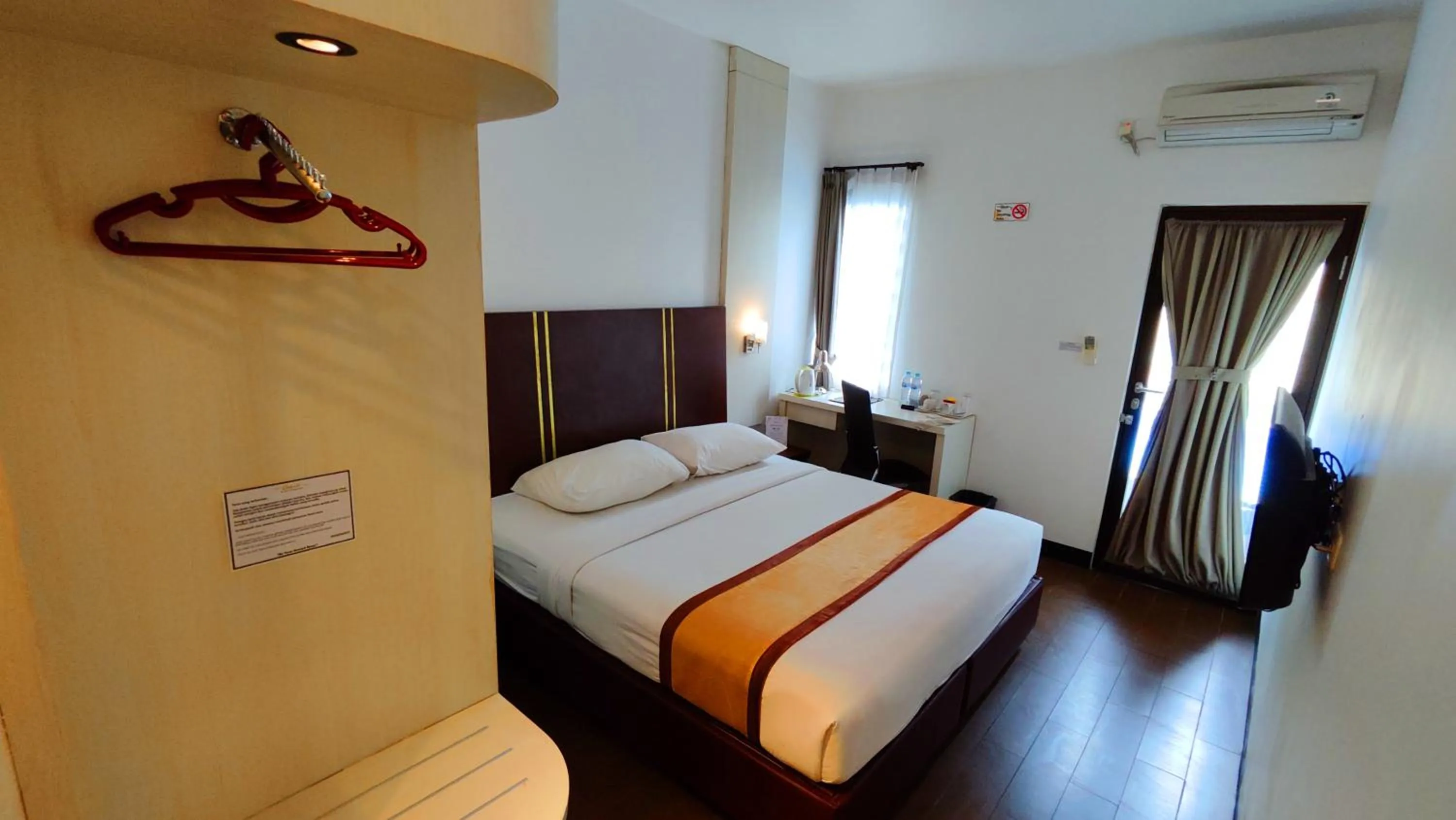 Bed in Odaita Hotel Pamekasan Madura