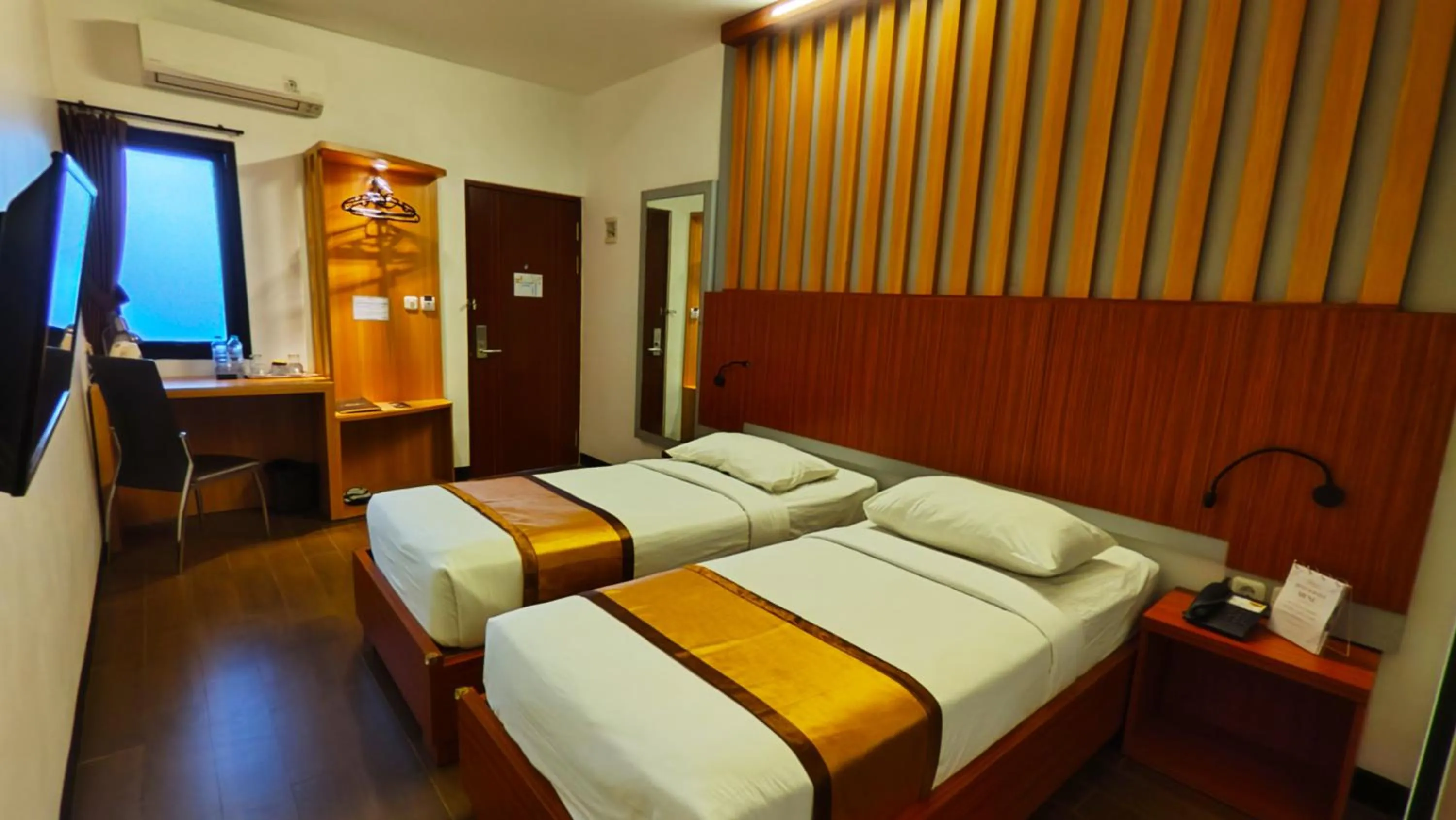 Bed in Odaita Hotel Pamekasan Madura