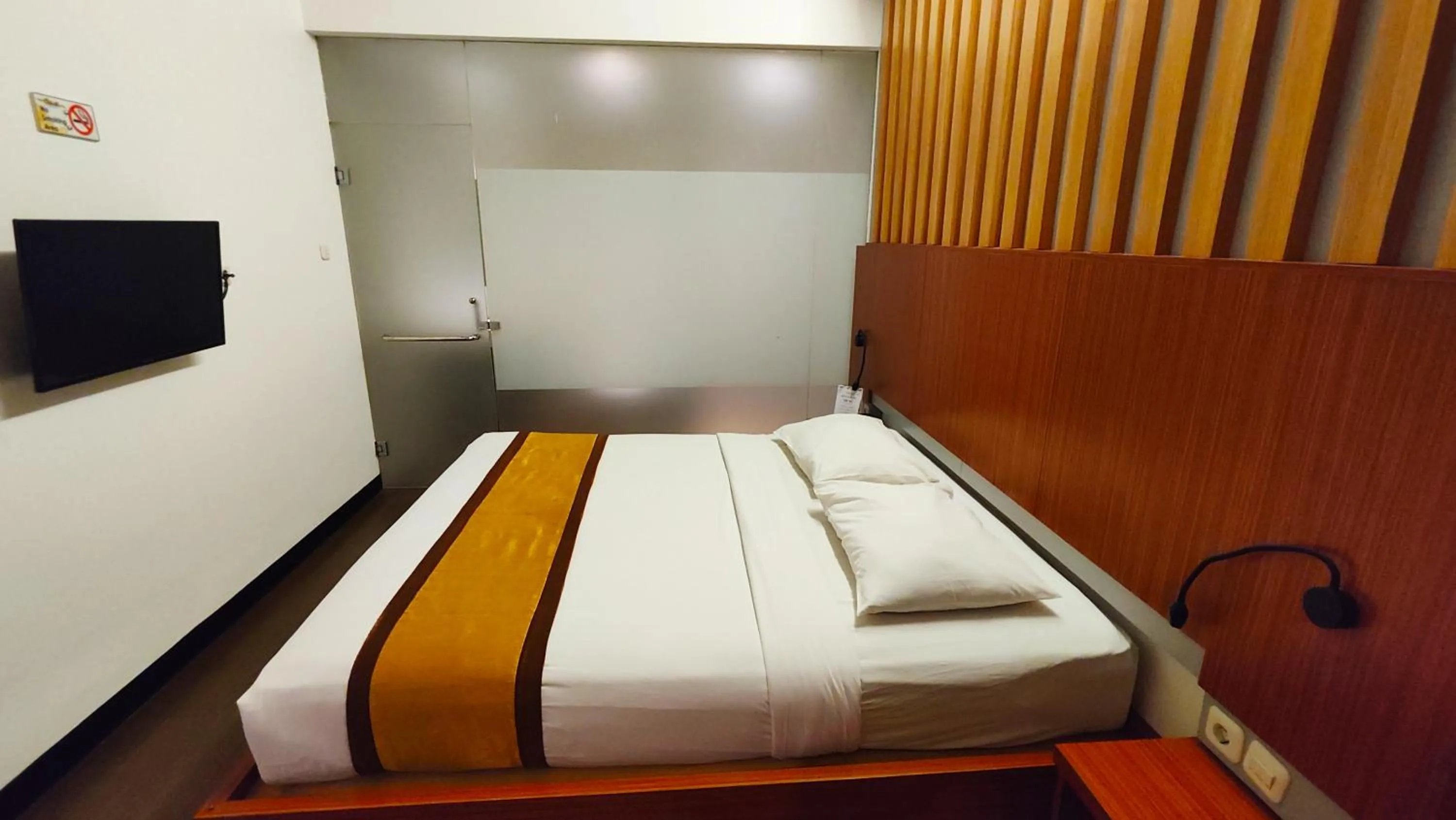 Bed in Odaita Hotel Pamekasan Madura
