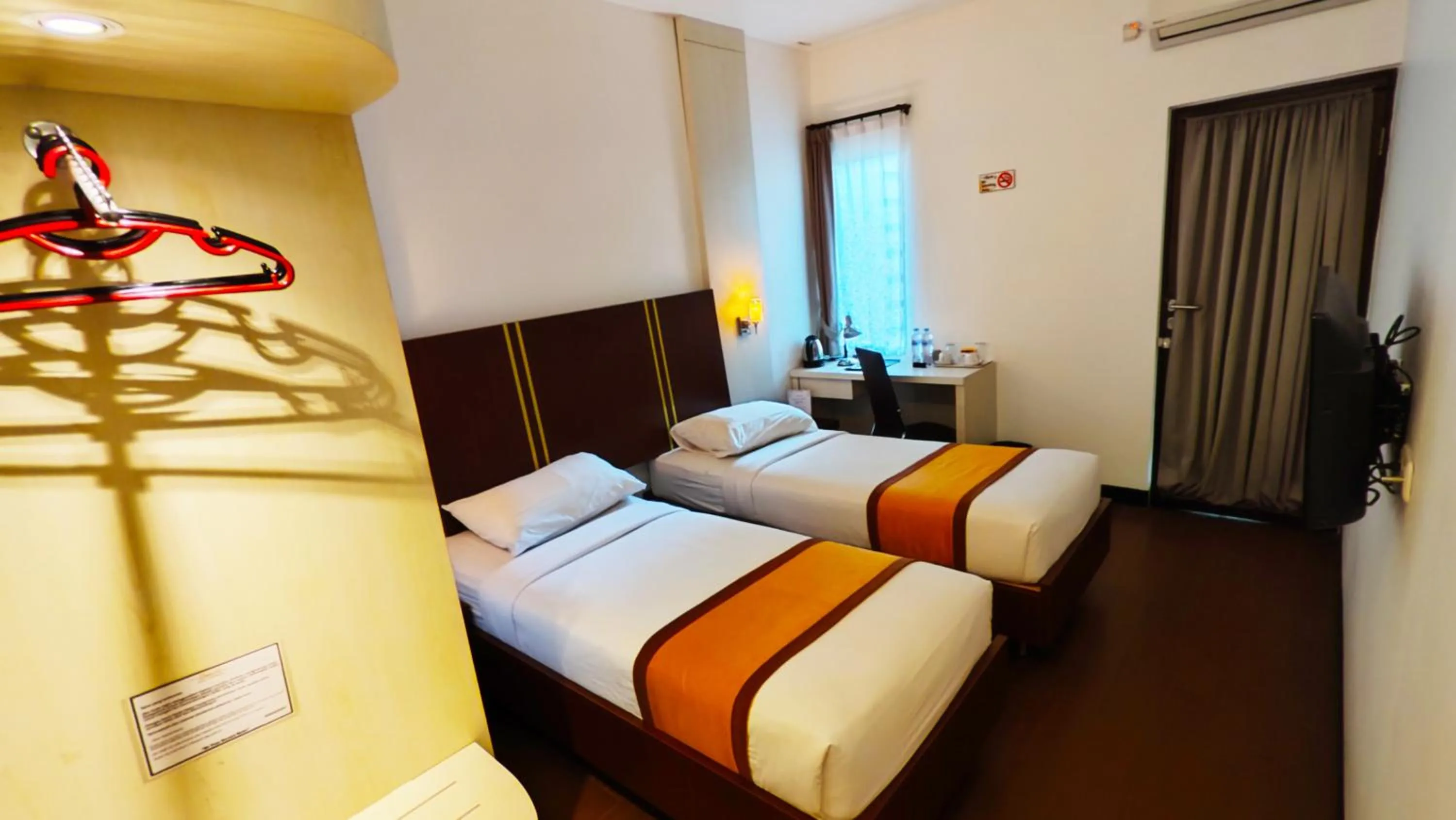 Bed in Odaita Hotel Pamekasan Madura