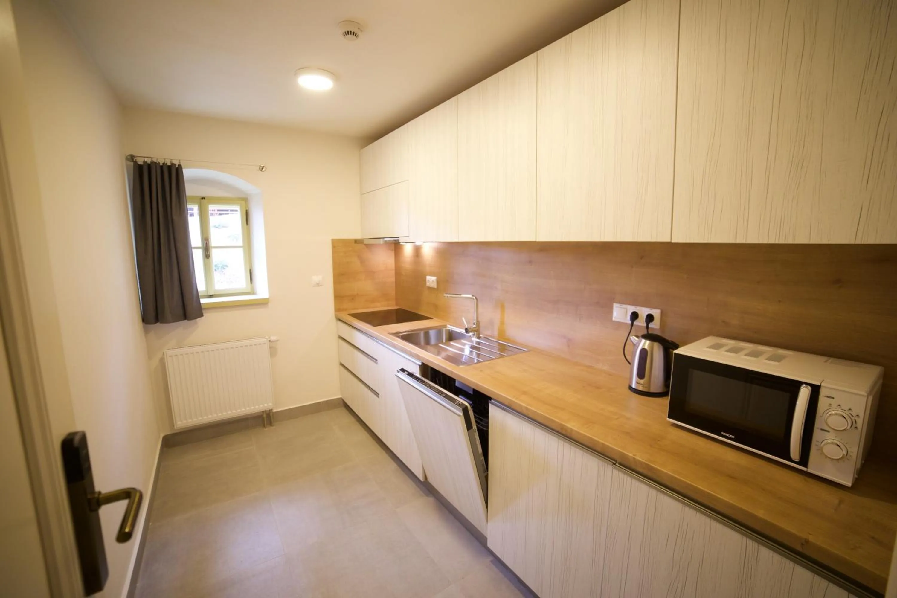 Communal kitchen in Resla Residence I, II, & Wellness