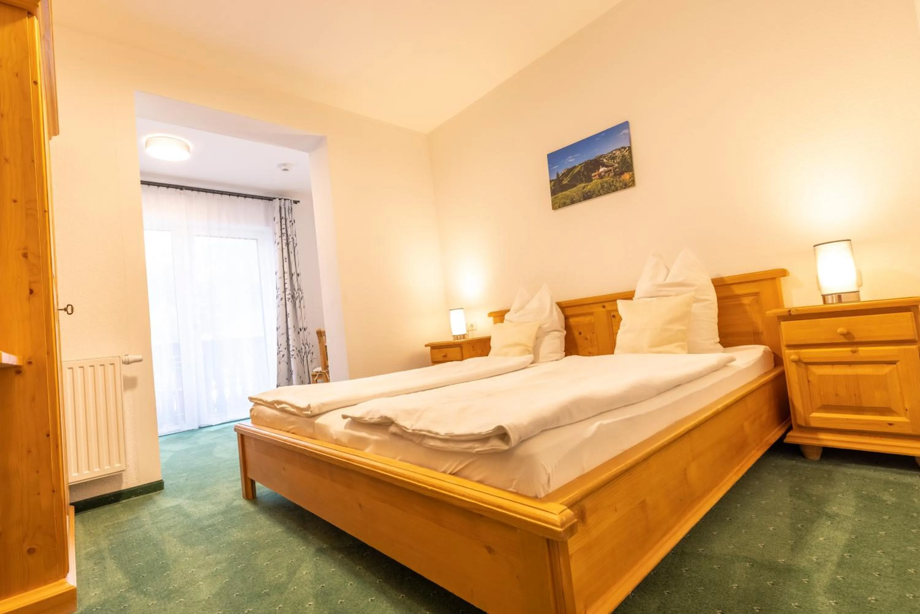 Photo of the whole room, Bed in Alpenhotel Ensmann
