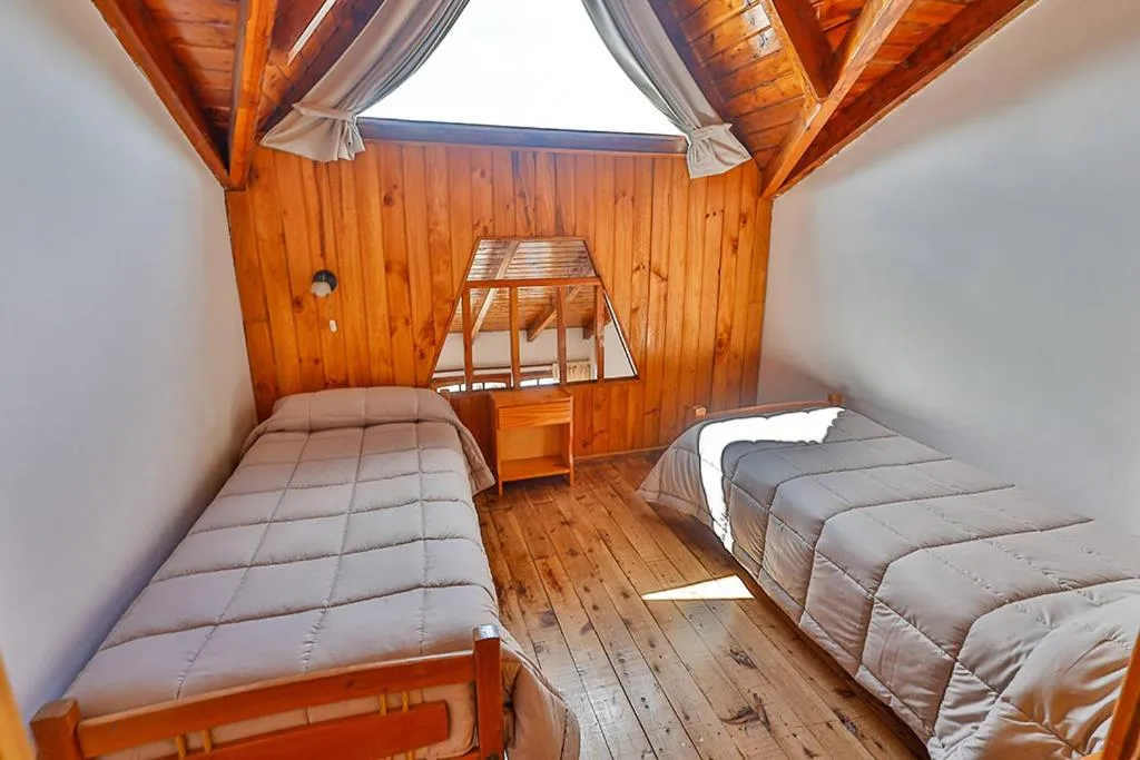 Bed in LA PONDEROSA Apart Hotel