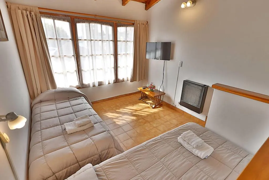 Bed in LA PONDEROSA Apart Hotel