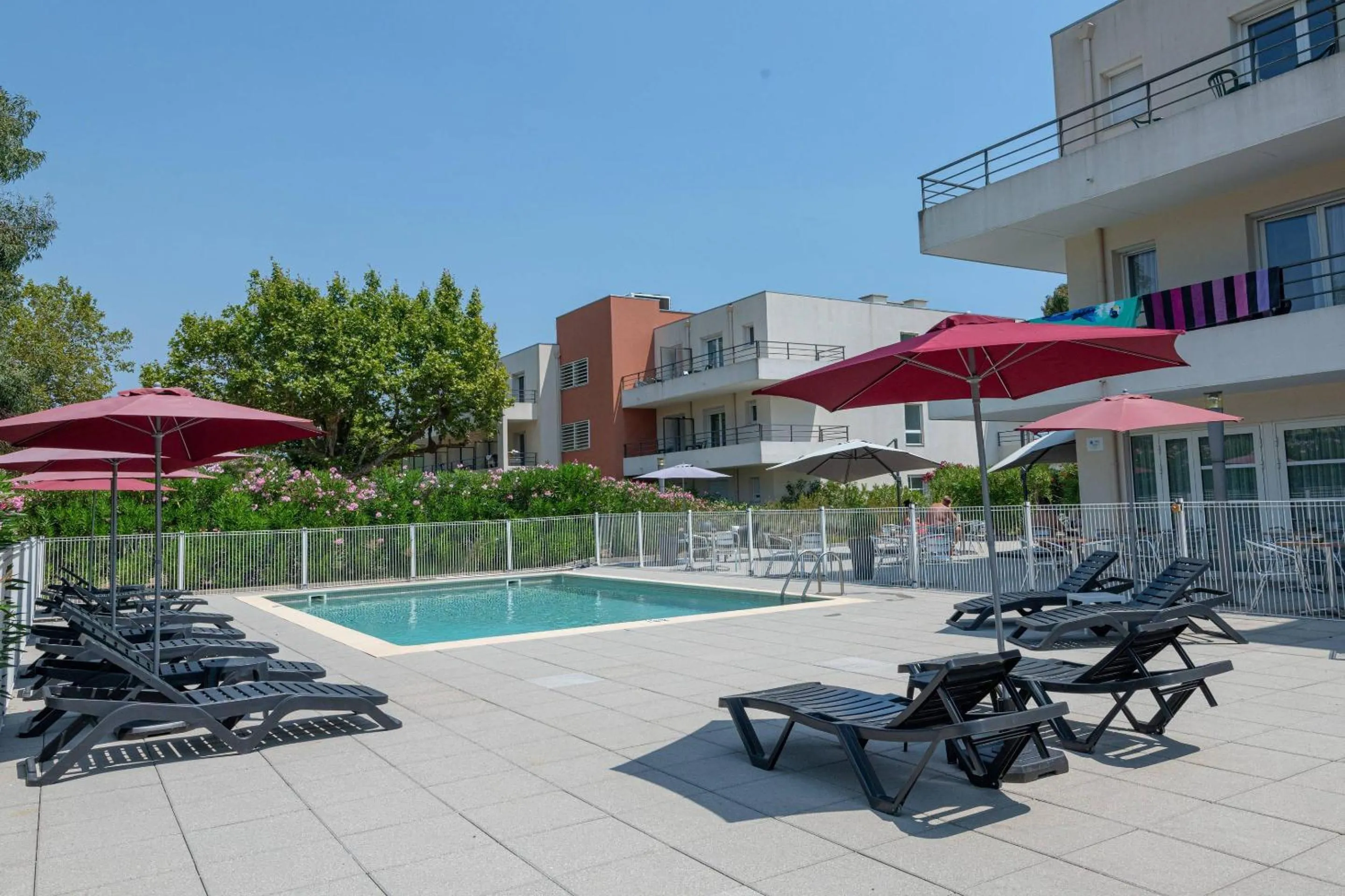 Swimming pool in Comfort Aparthotel Cannes Mandelieu