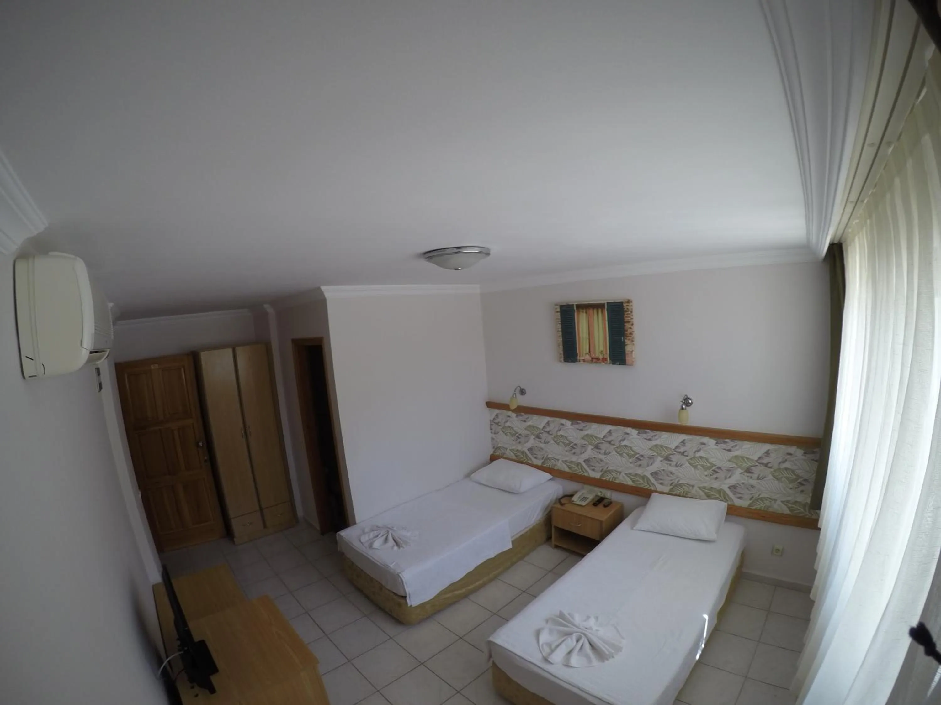 Photo of the whole room, Bed in Gun-Ay Hotel