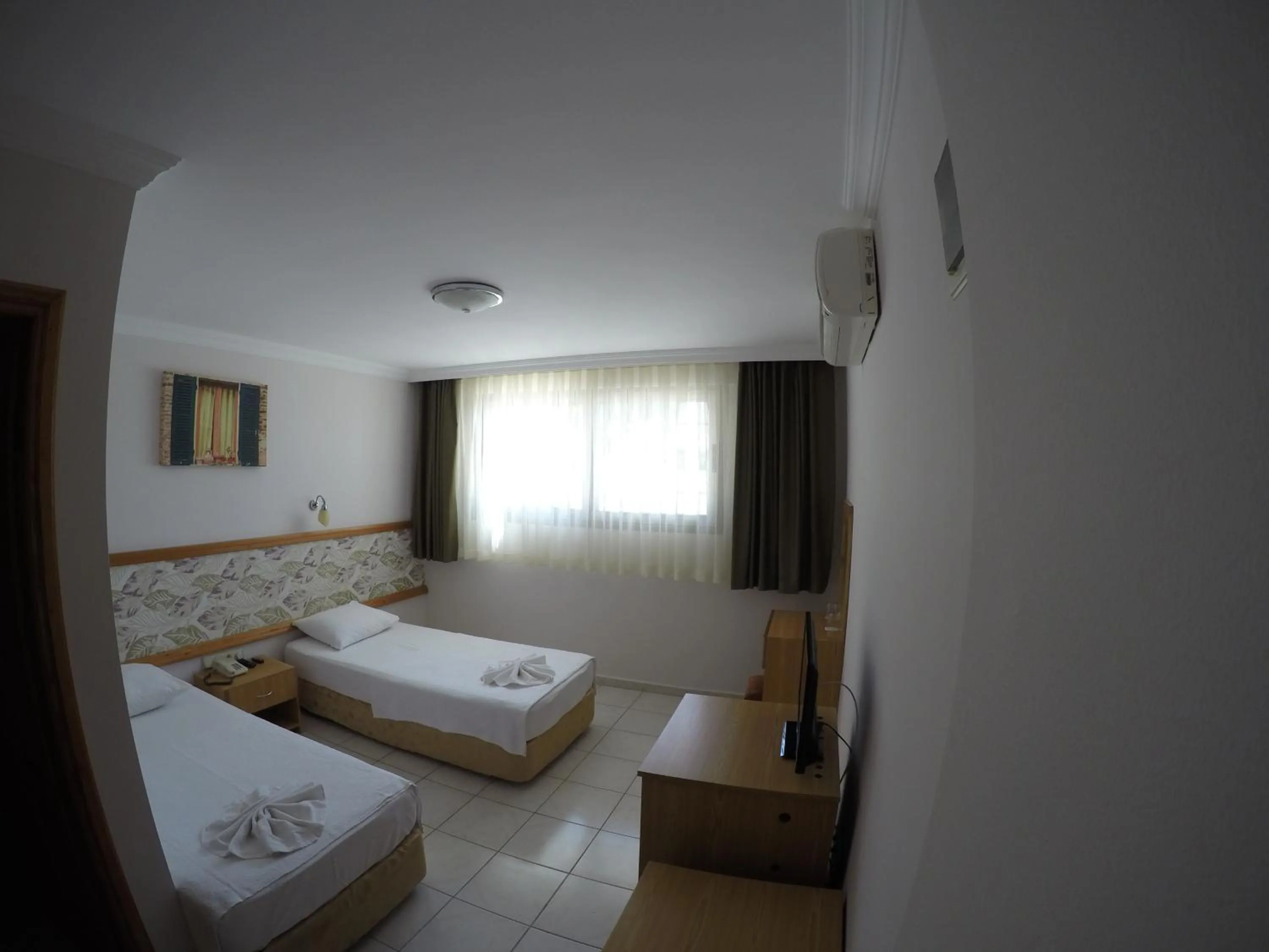 Photo of the whole room, Bed in Gun-Ay Hotel