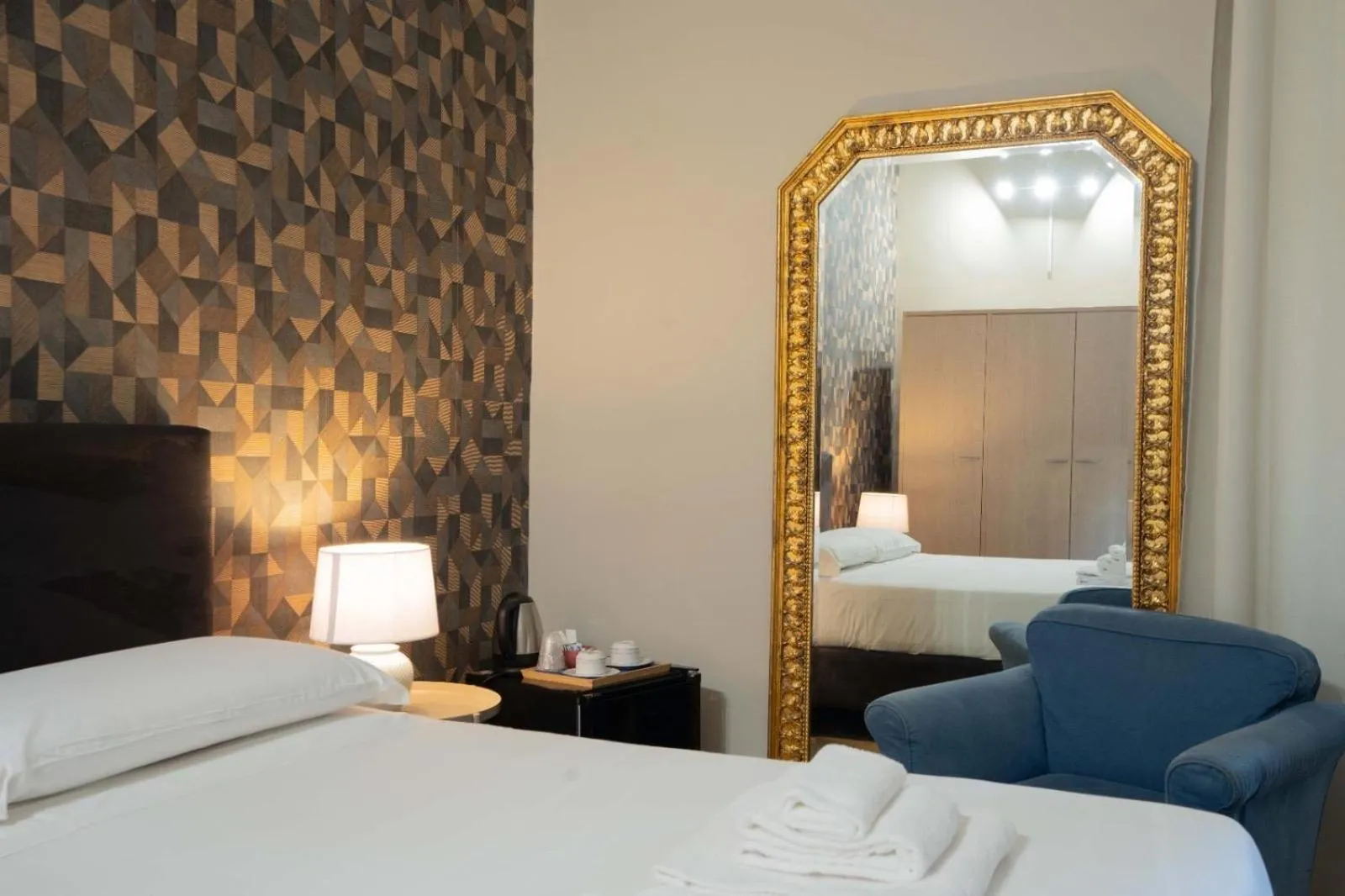 Bed in Hotel Trieste