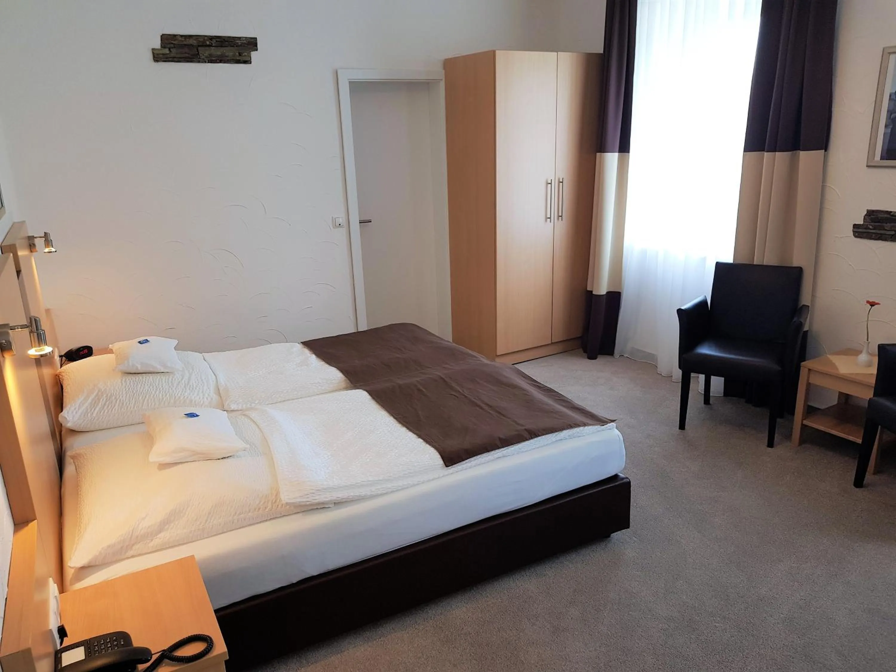 Bed in Hotel zum Anker