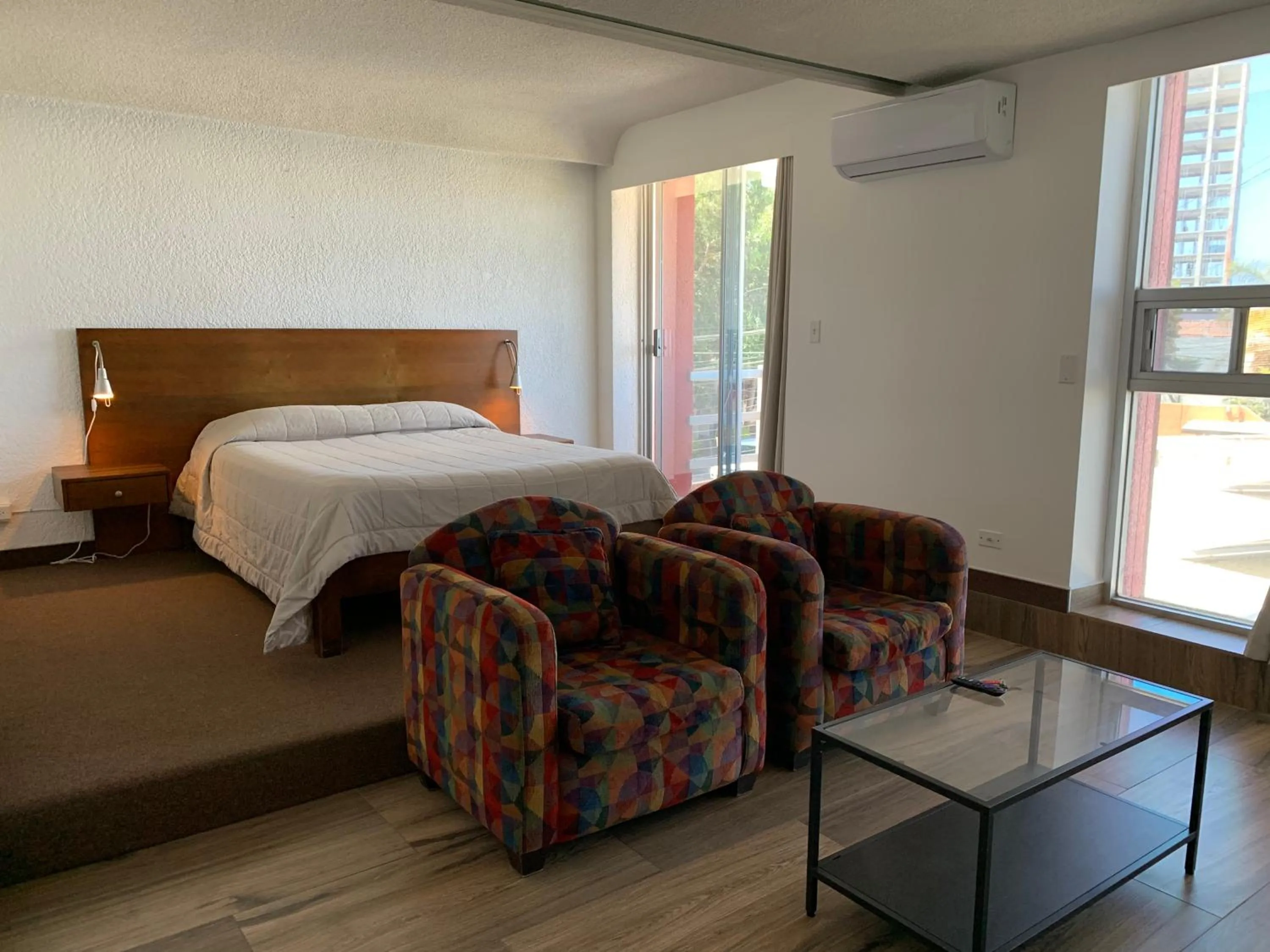 Photo of the whole room, Bed in Dali Suites -Accommodations in Playas de Tijuana