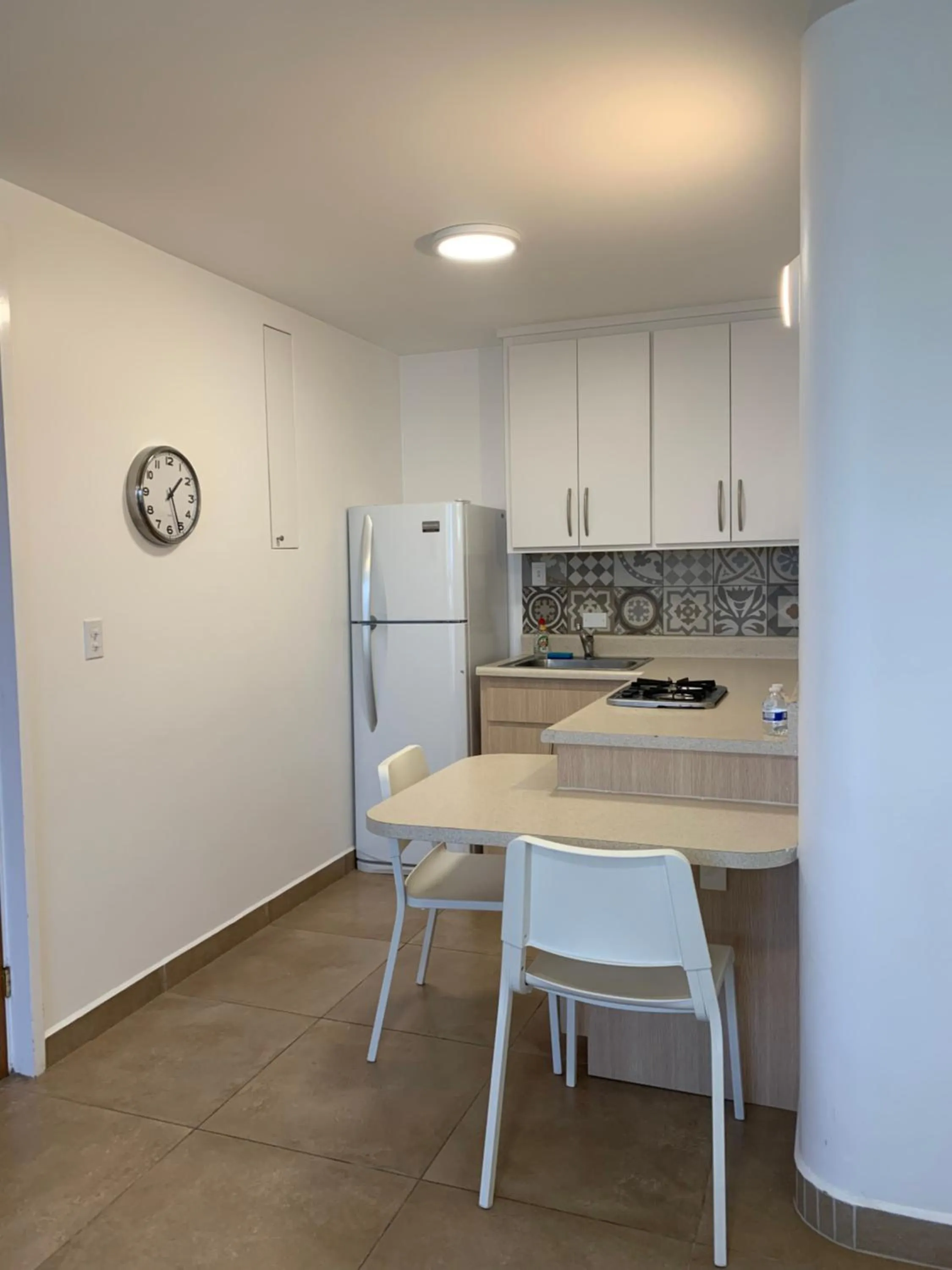 Kitchen or kitchenette in Dali Suites -Accommodations in Playas de Tijuana