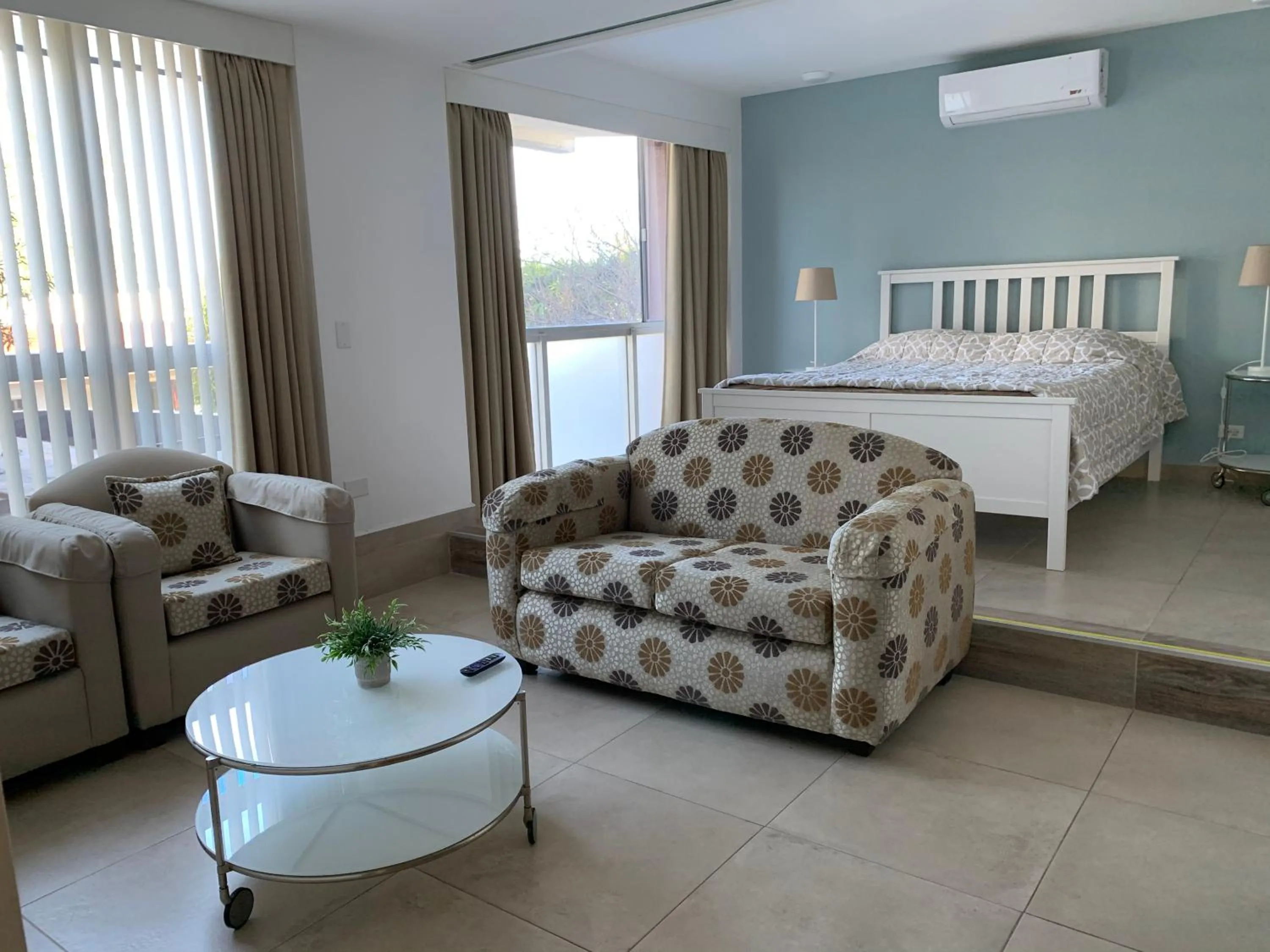 Photo of the whole room, Bed in Dali Suites -Accommodations in Playas de Tijuana