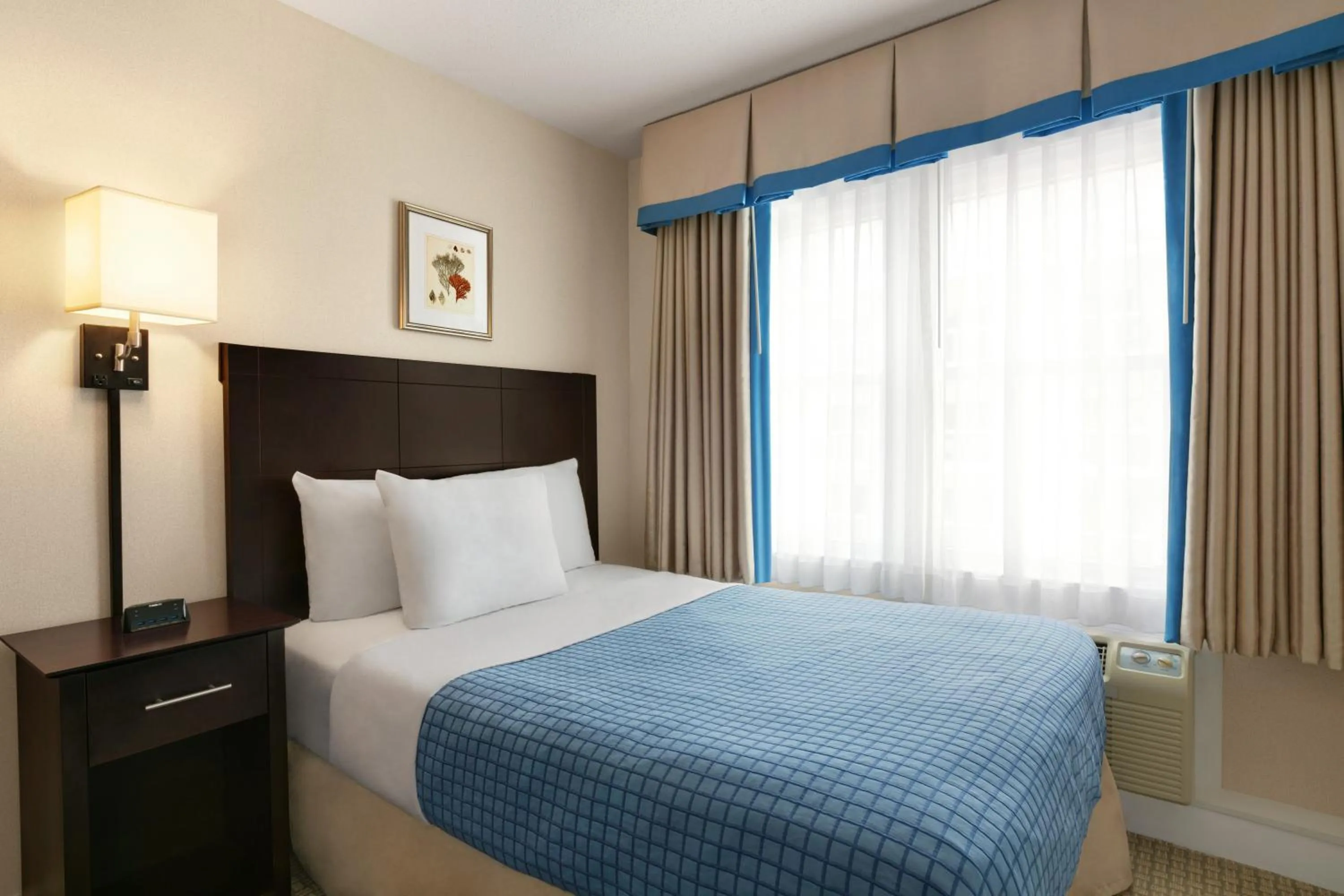 Bed in Harrison Hall Hotel