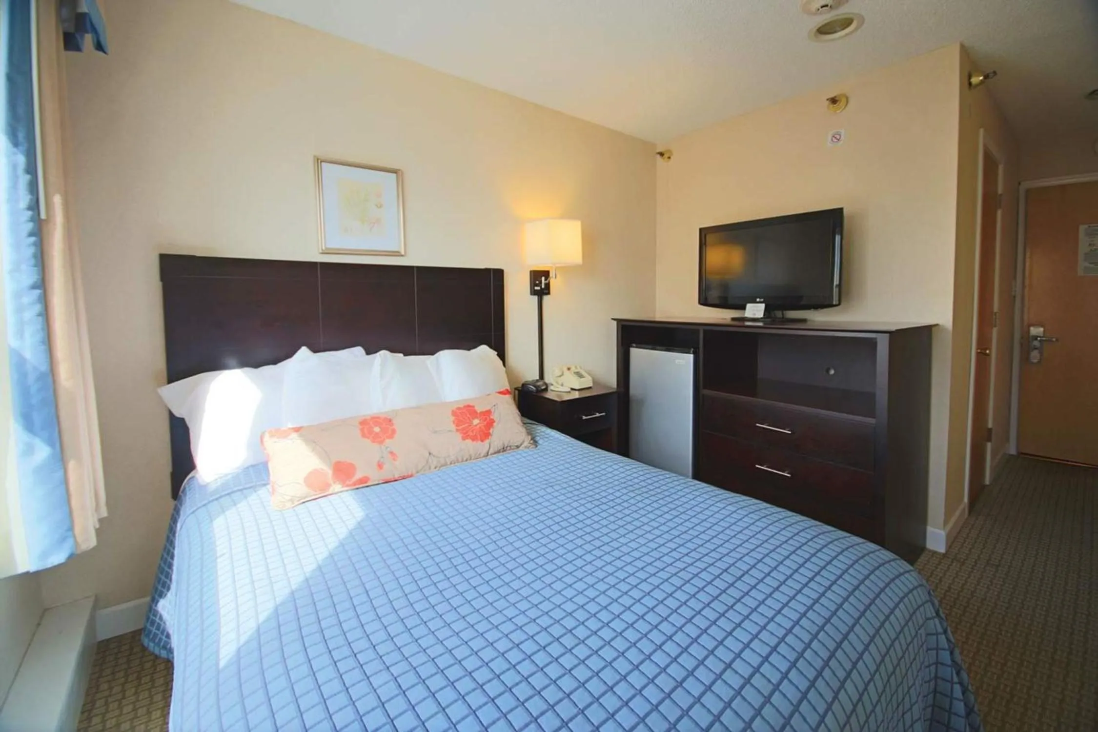 Bed in Harrison Hall Hotel