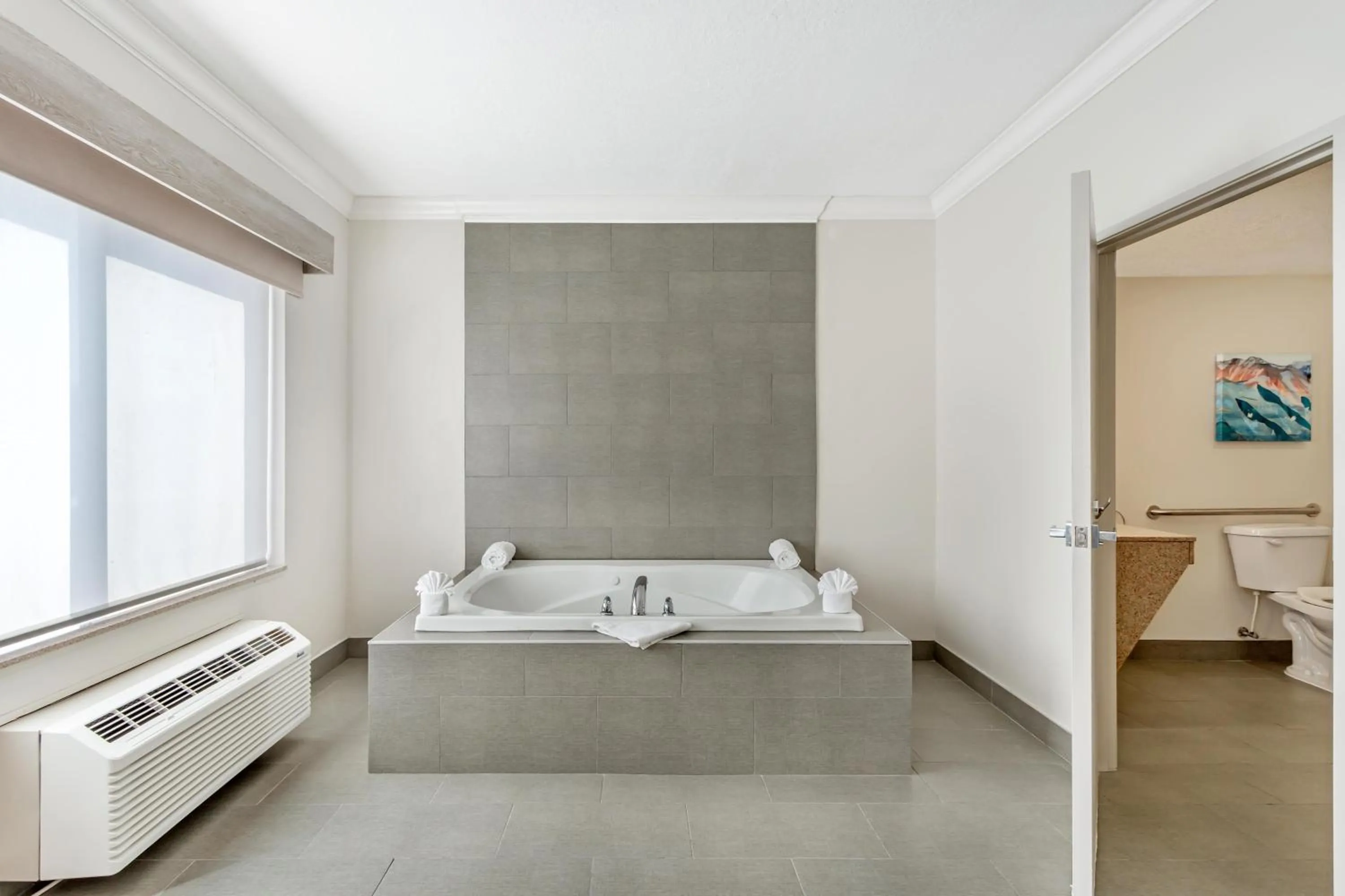 Bedroom in Best Western Plus Airport Inn & Suites