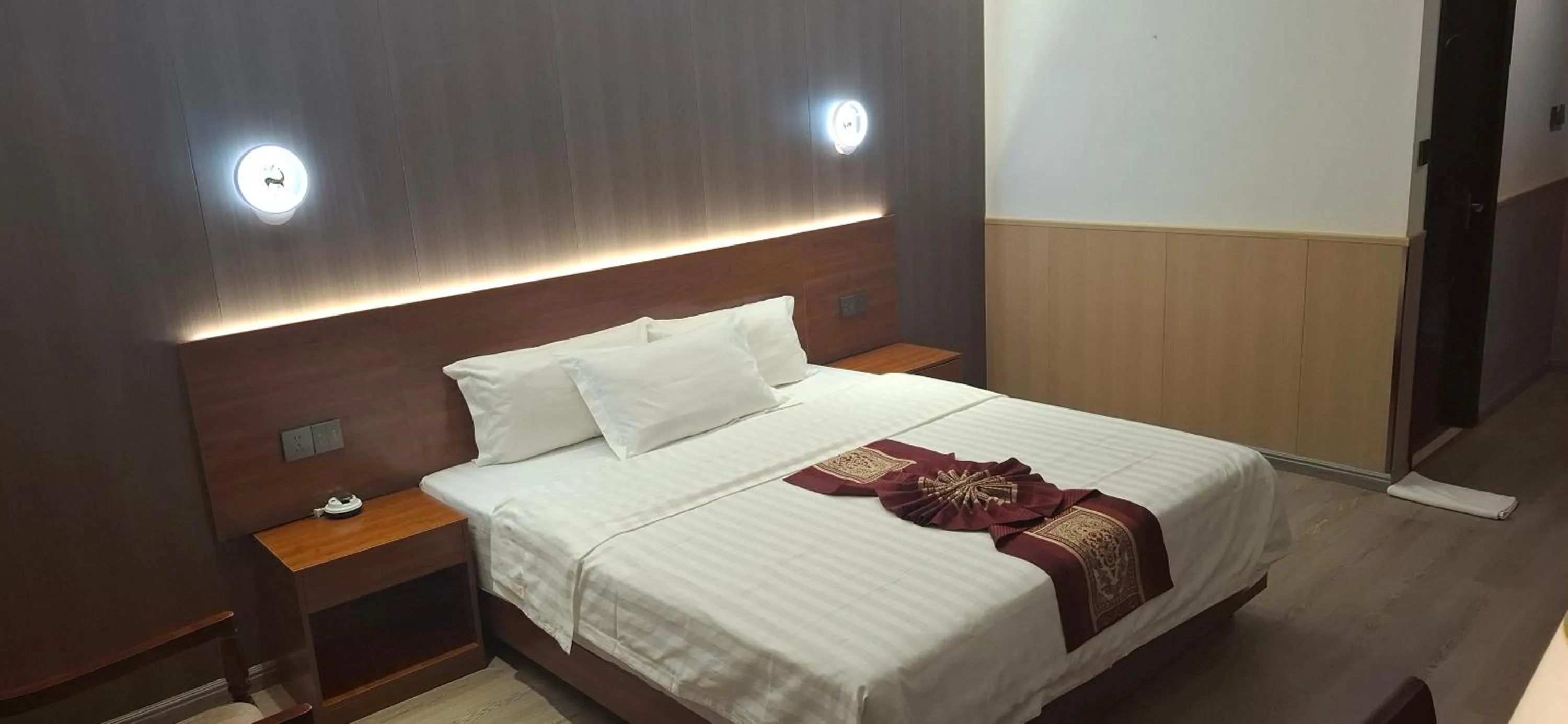 Bed in Beach Garden Hotel