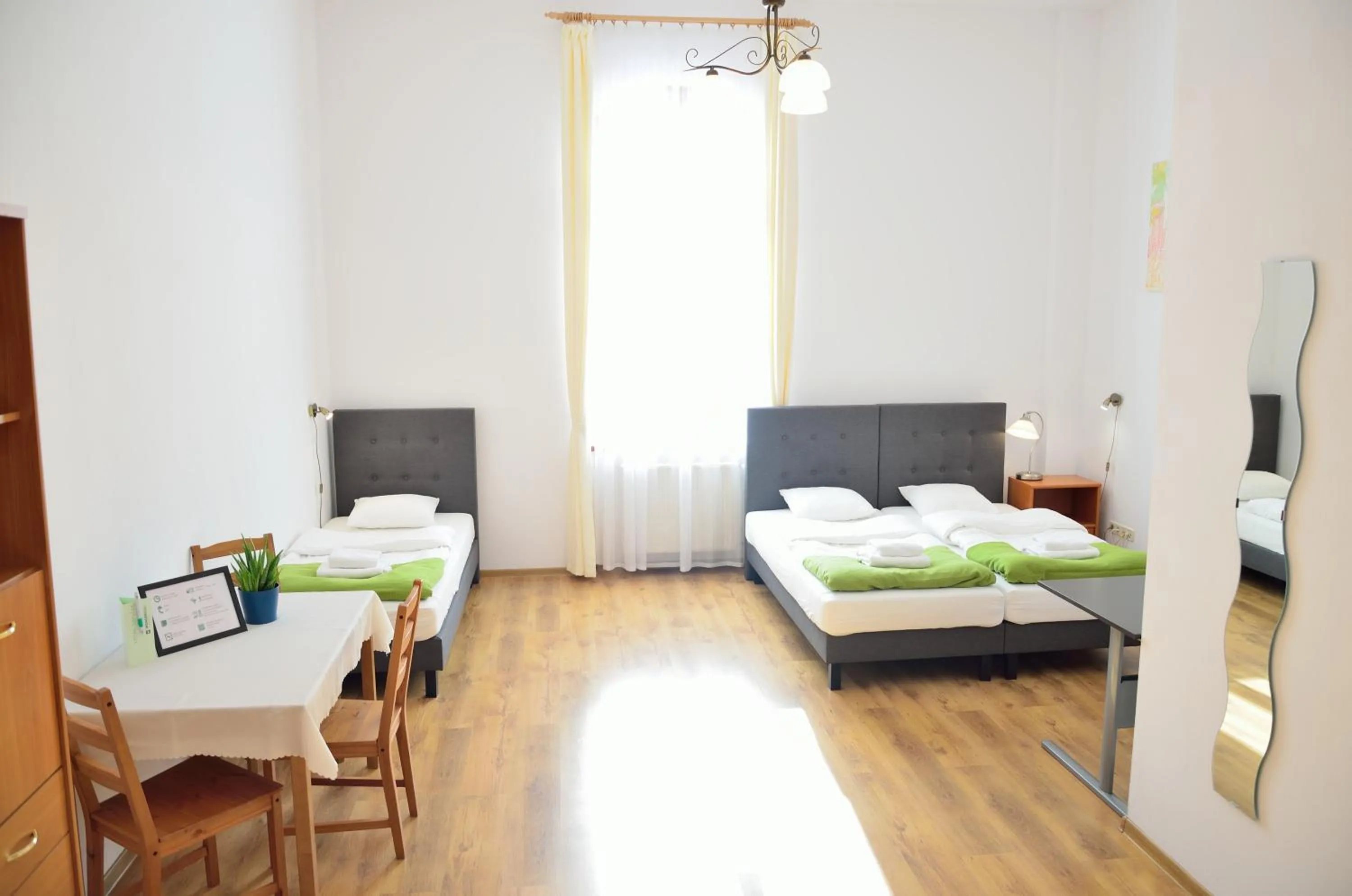 Photo of the whole room, Bed in WenderEDU Business Center