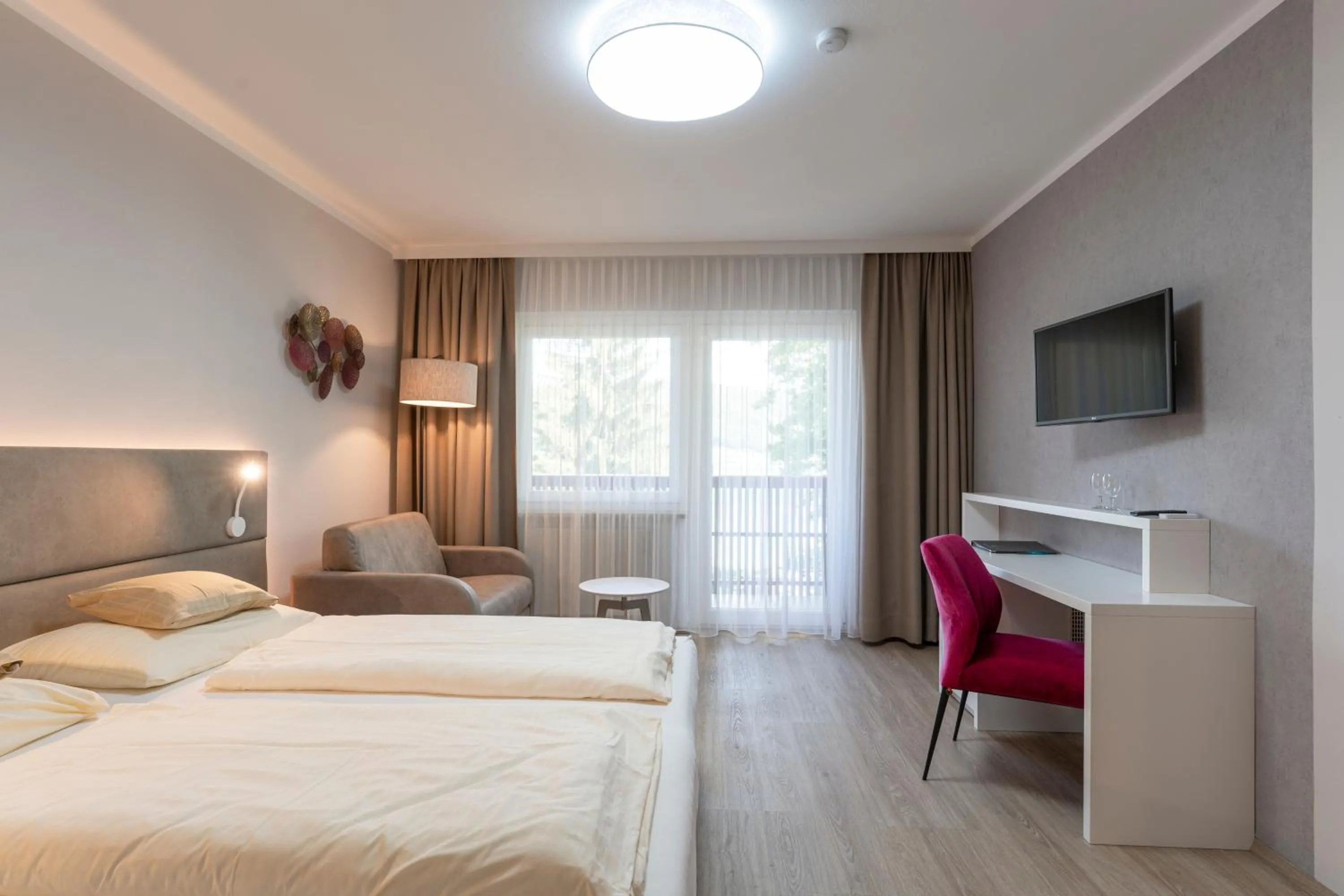 Photo of the whole room, Bed in Seehotel Vinzenz