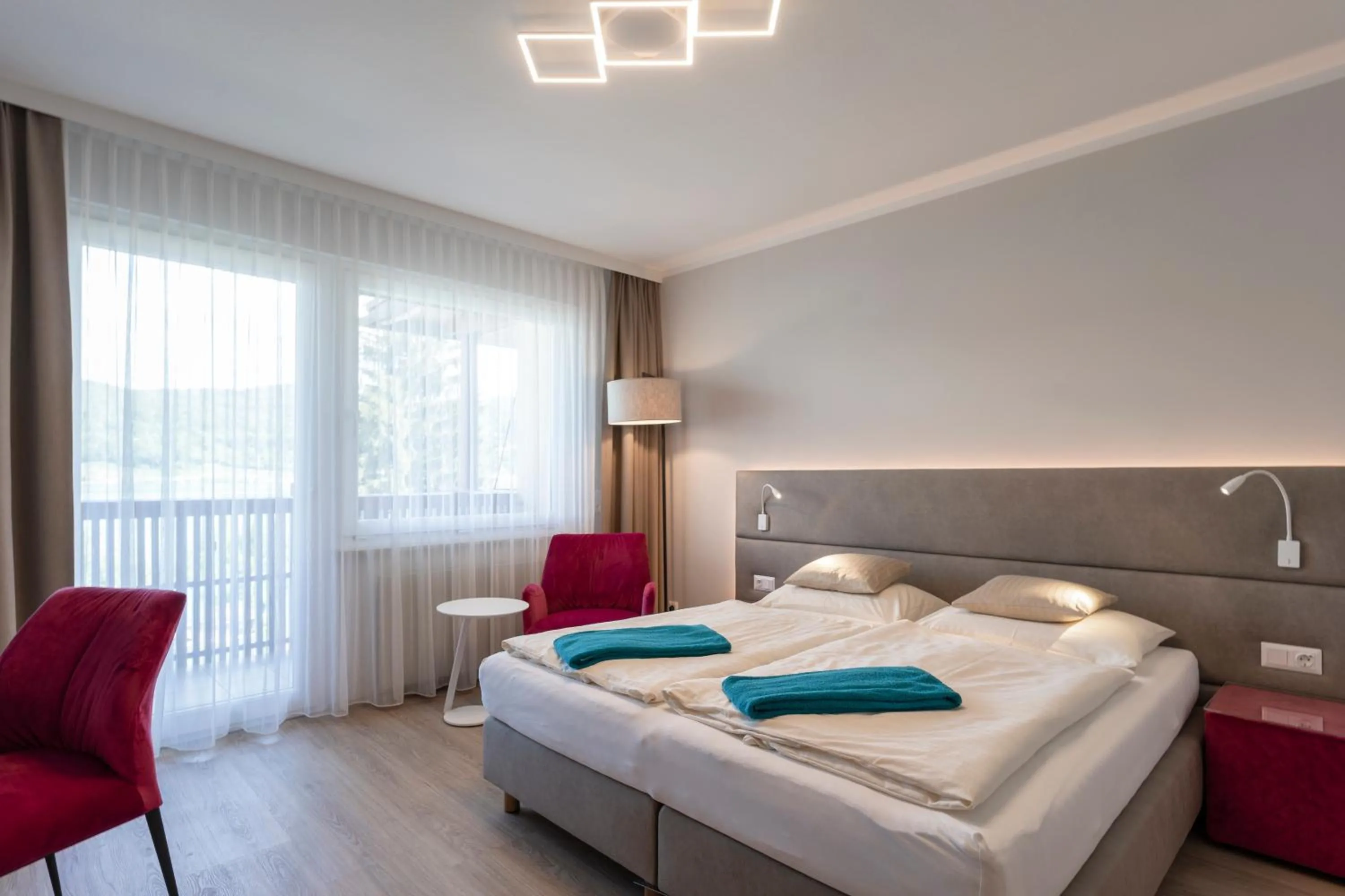 Photo of the whole room, Bed in Seehotel Vinzenz