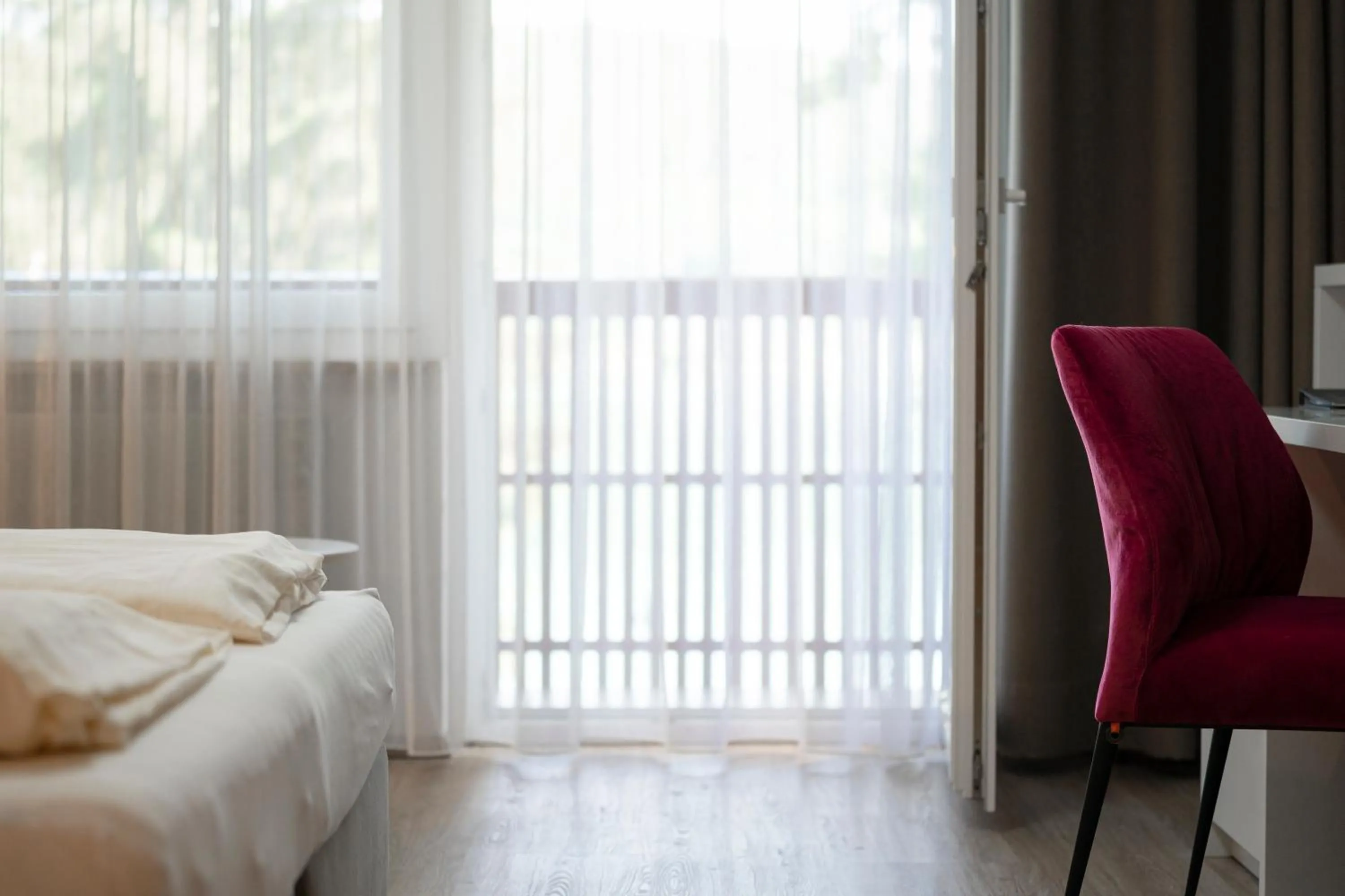 Photo of the whole room, Bed in Seehotel Vinzenz
