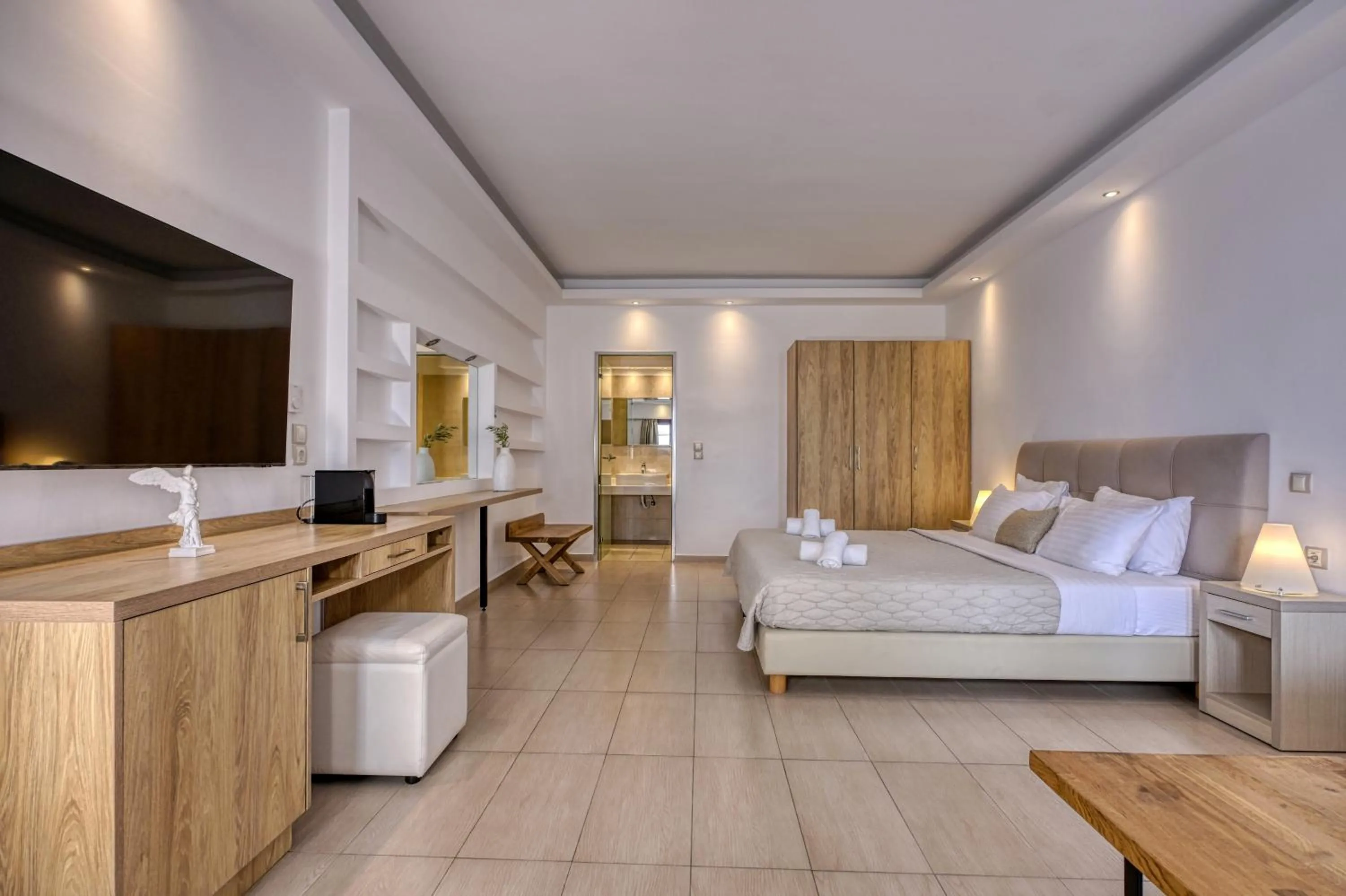 Bed in Splendour Hotel and Suites