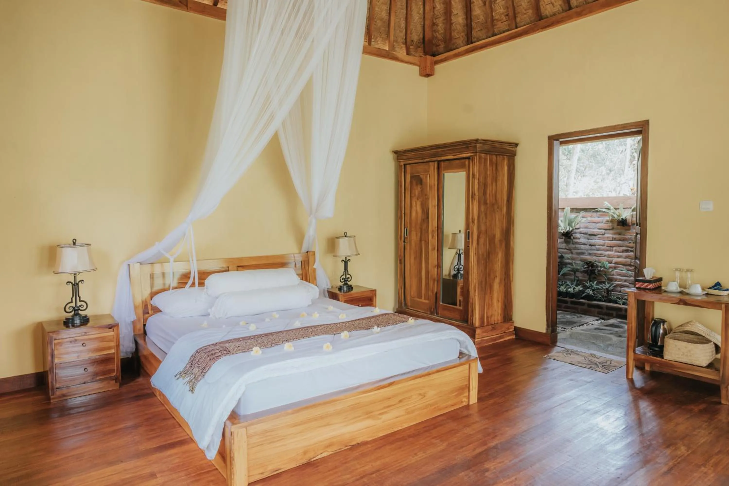 Bed in Saridevi Ecolodge