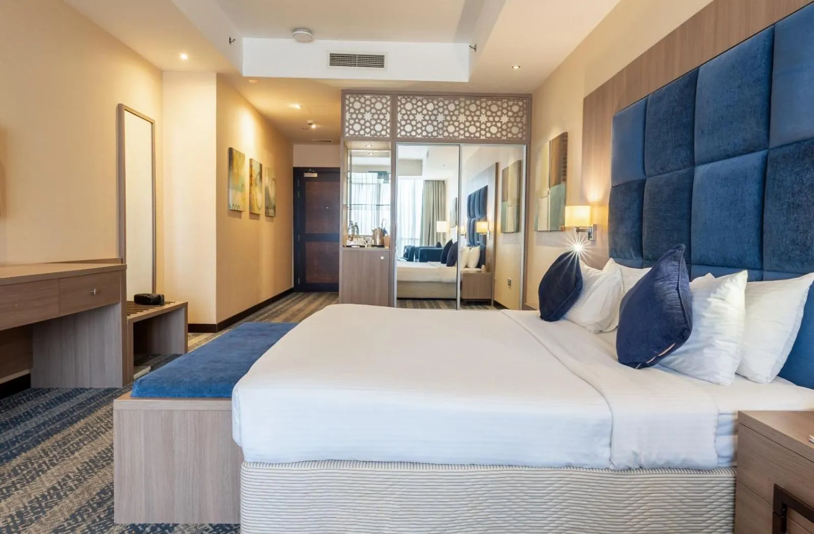 Bed in The CASTLE PREMIUM HOTEL